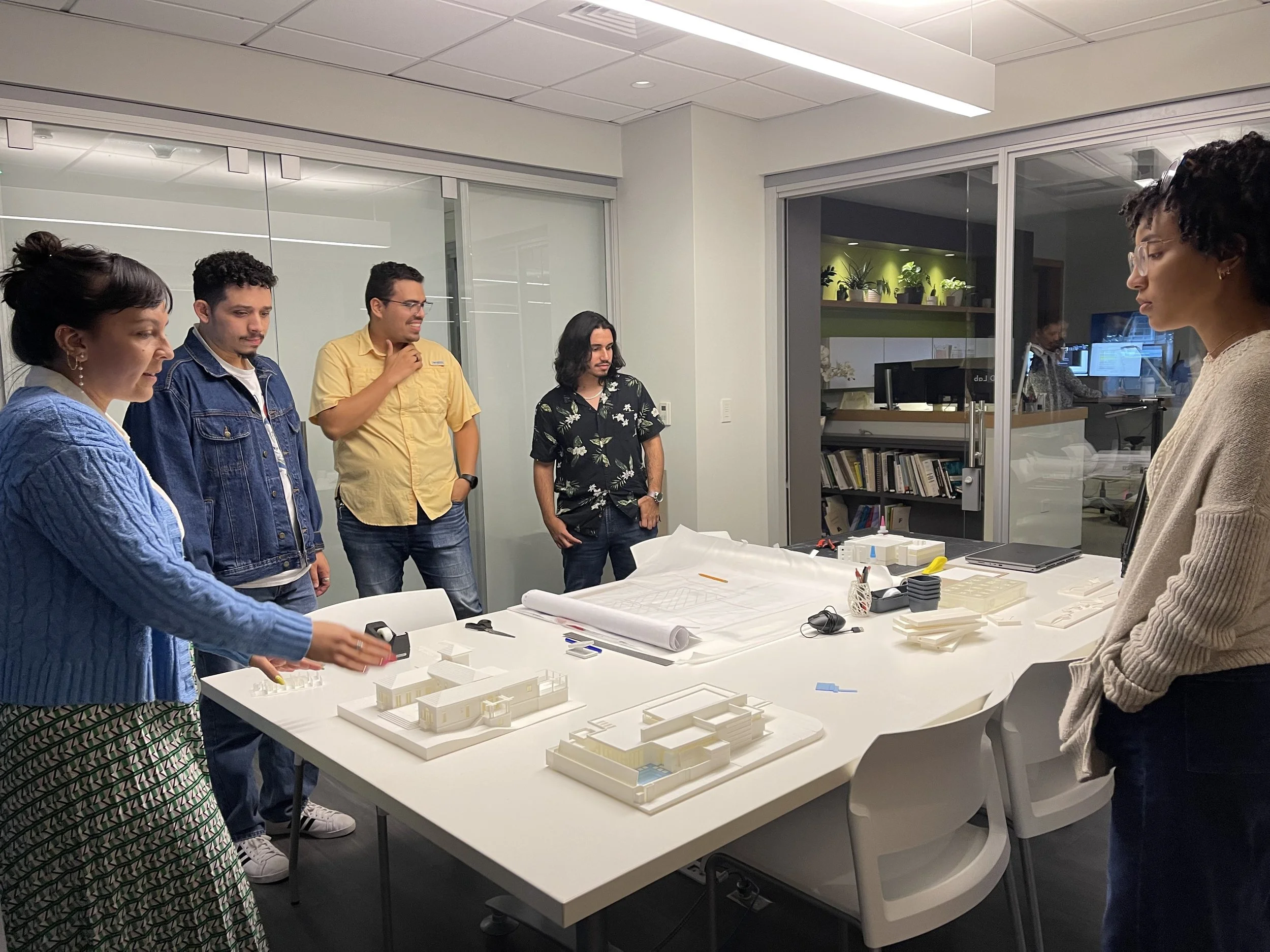 AD&V Team Member giving students a tour of the AD&V office.