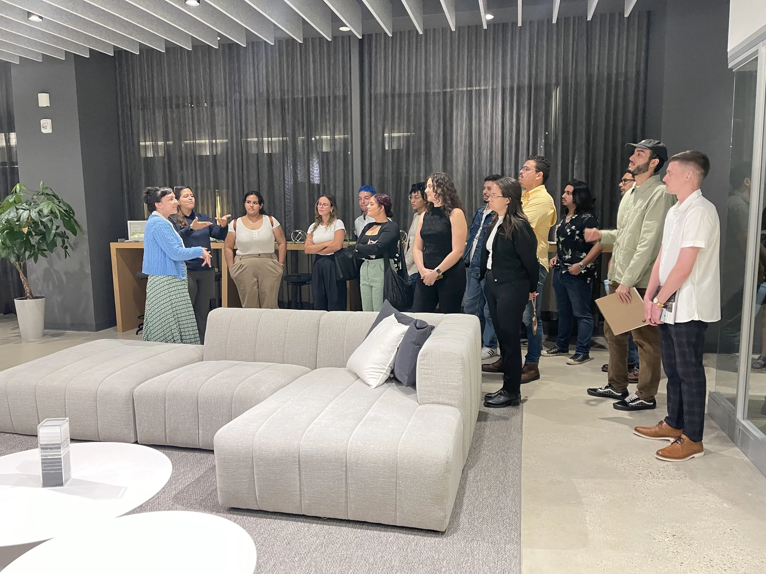 AD&V Team Member giving students a tour of the AD&V office.