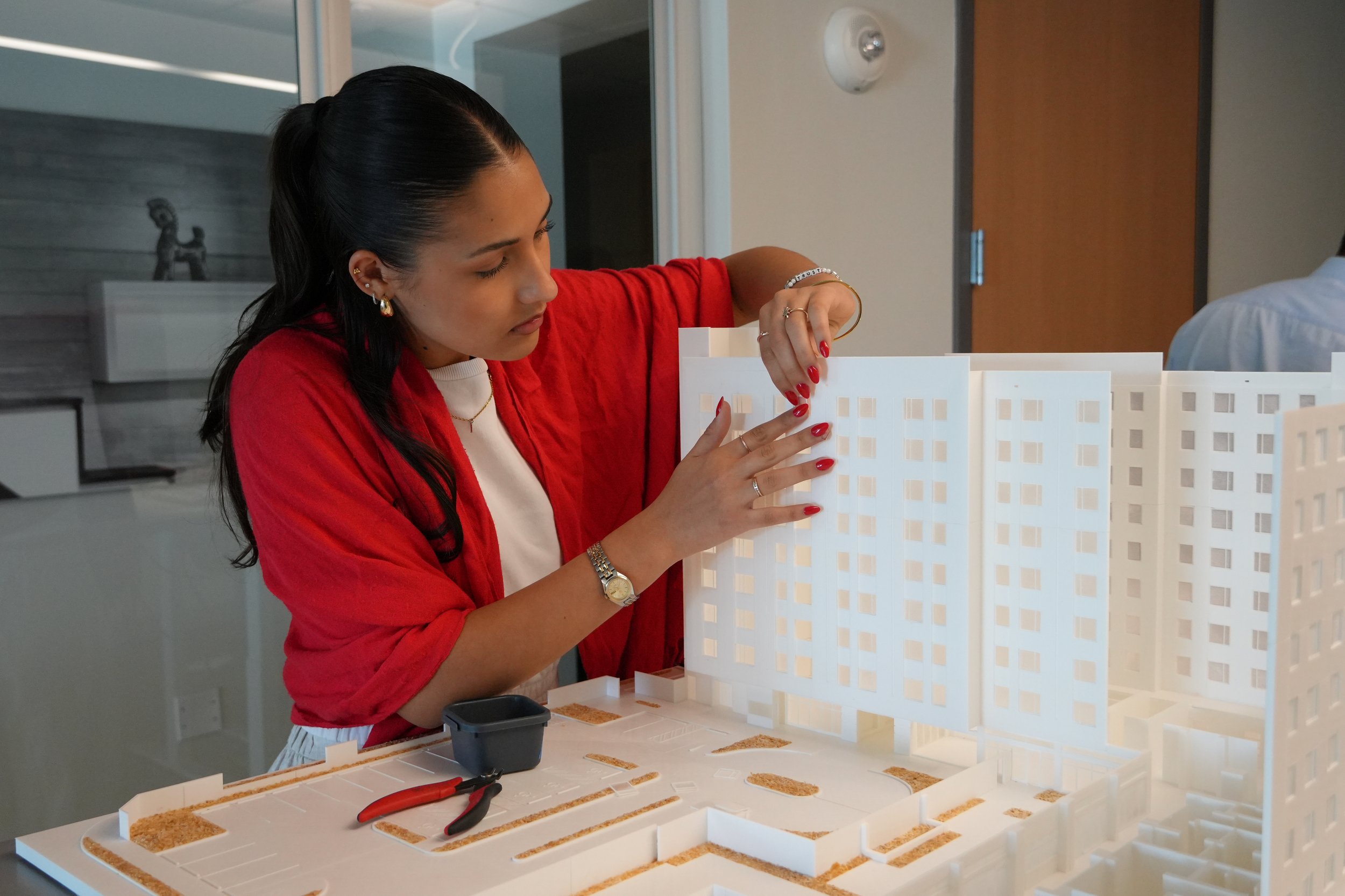 AD&V intern working on a 3d printed project model.