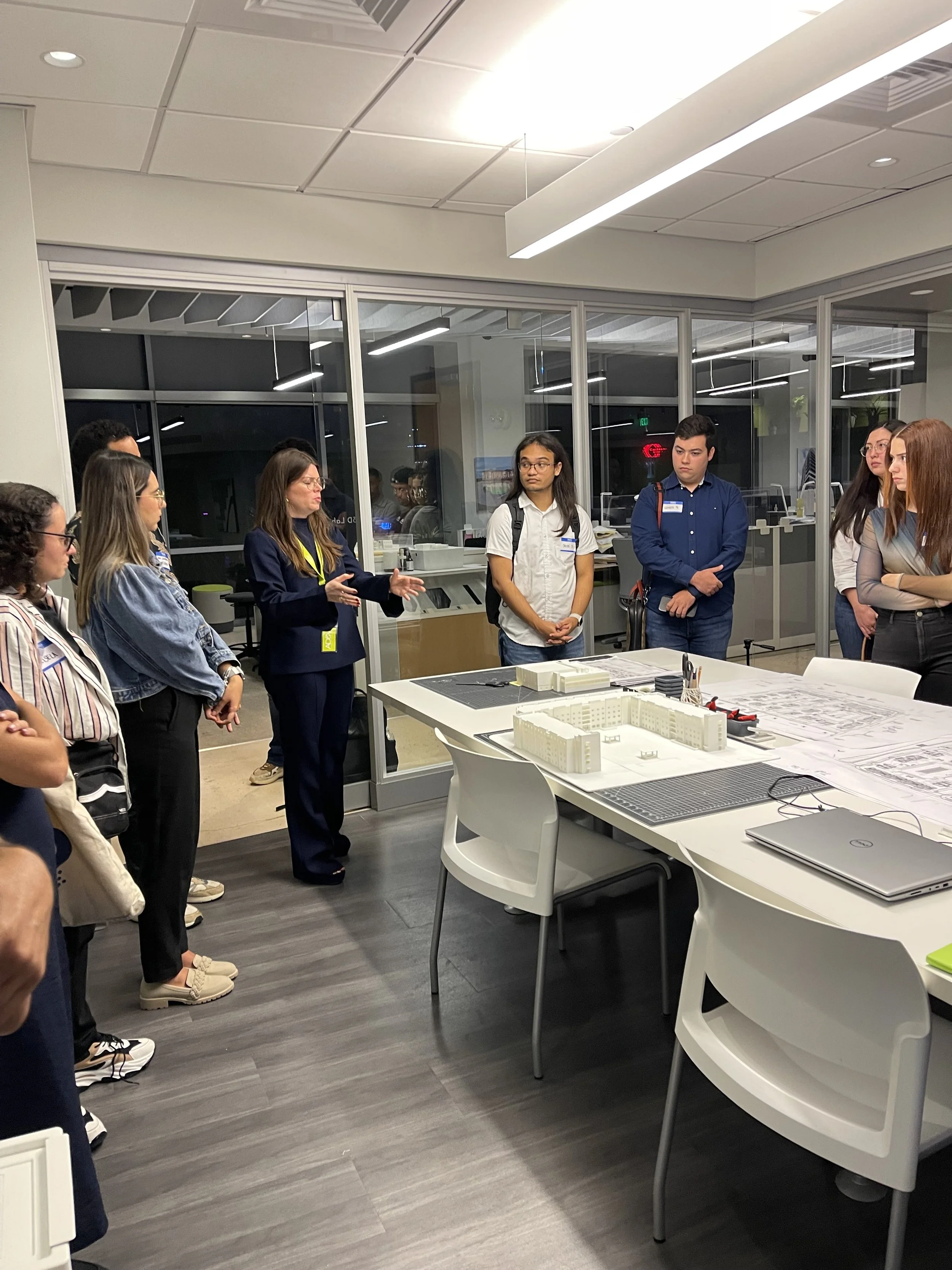 AD&V Team Member giving students a tour of the AD&V office.