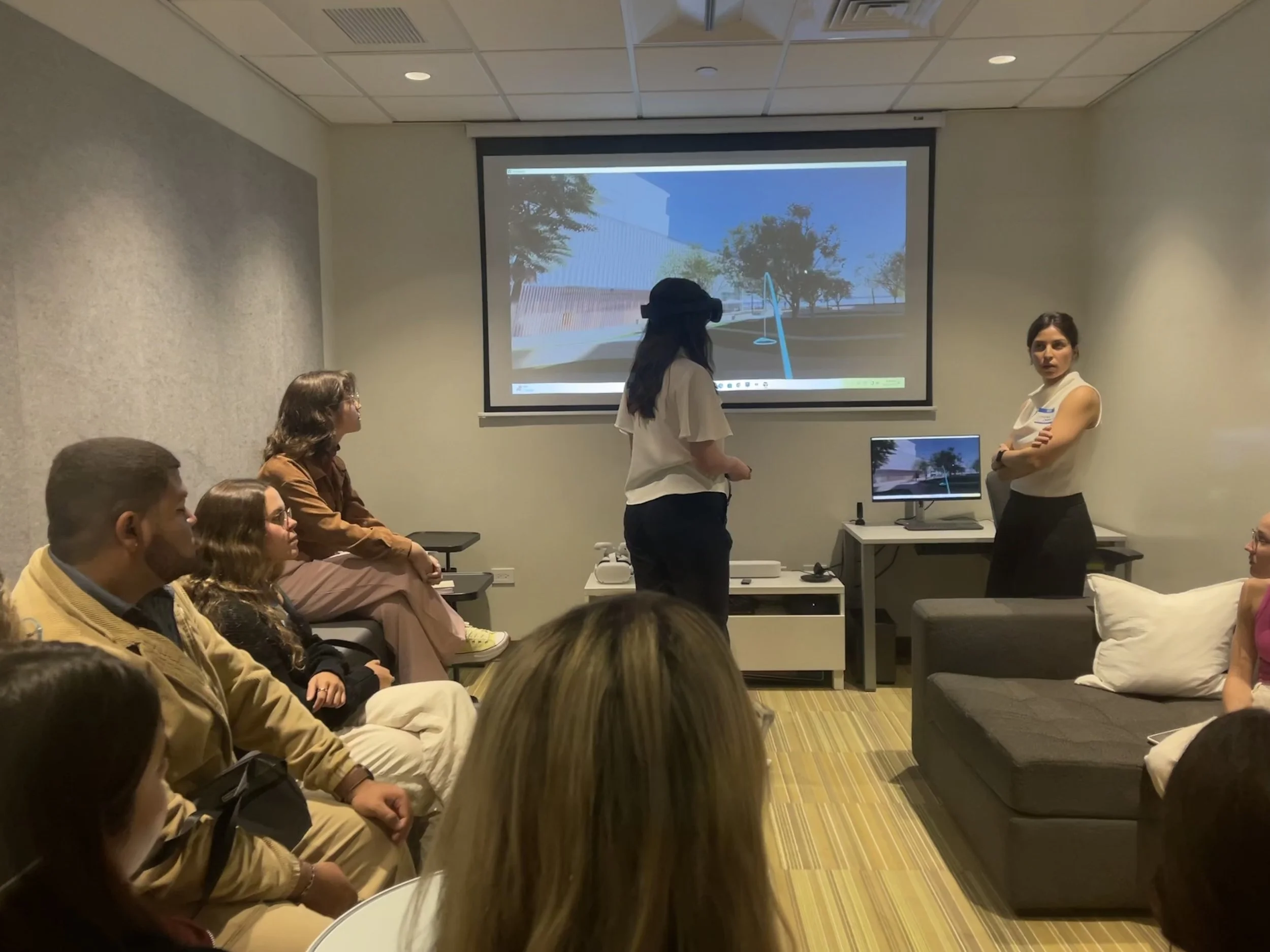 AD&V Team Member giving students a tour of the AD&V office.