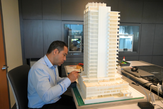 AD&V team member working on a 3d printed project model.