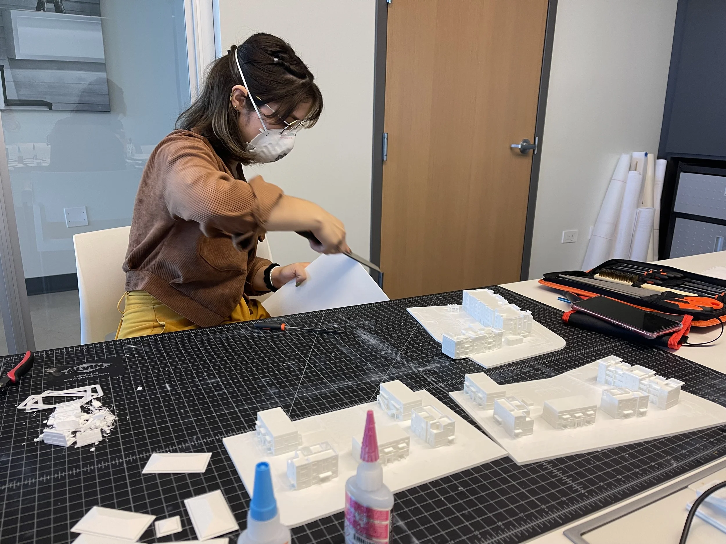 AD&V intern working on a project model.