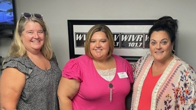 Pictured from left to right are Kennilyn Hickory, Liz Gibson, and a WVLI host.