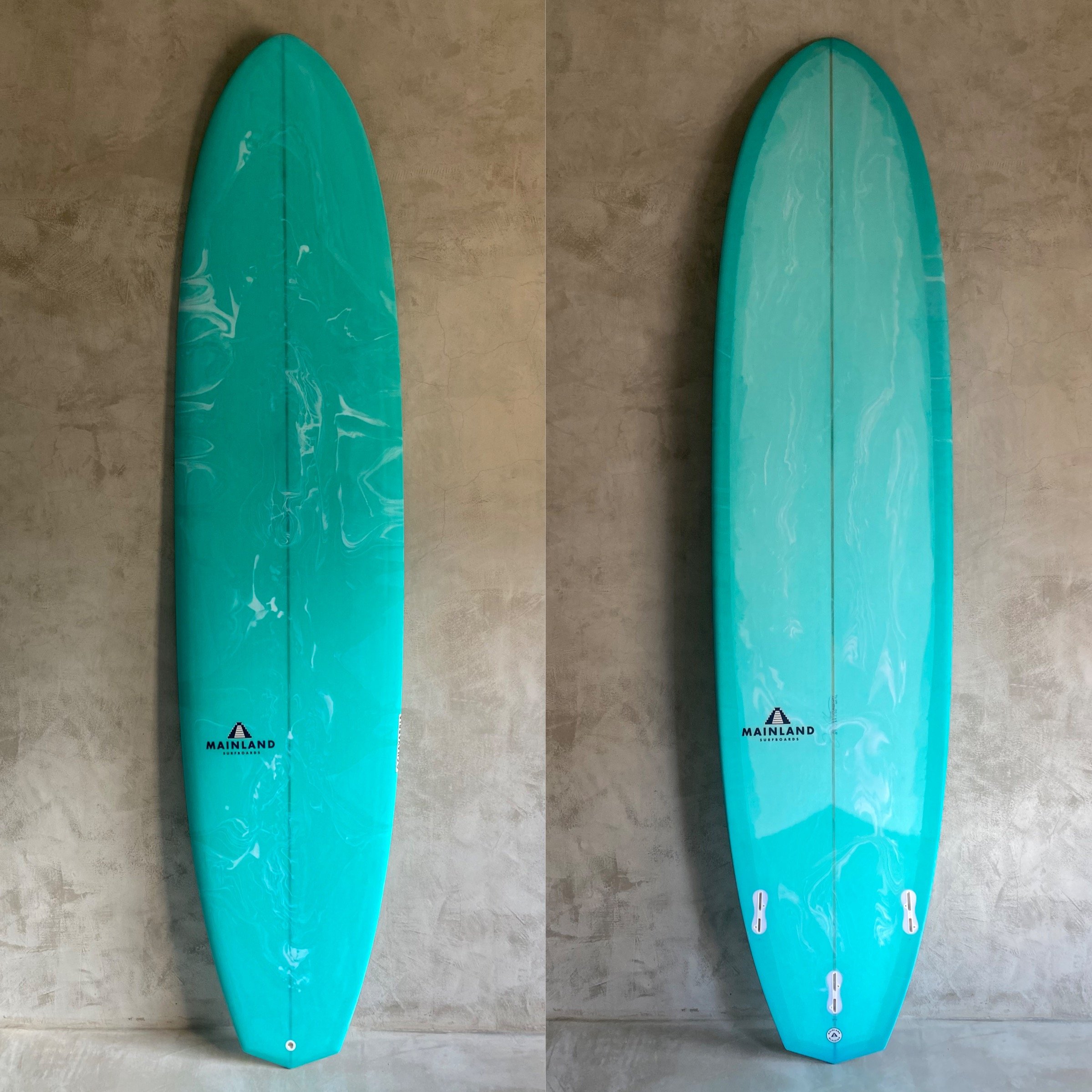 Teal and white surfboard - fun shape custom