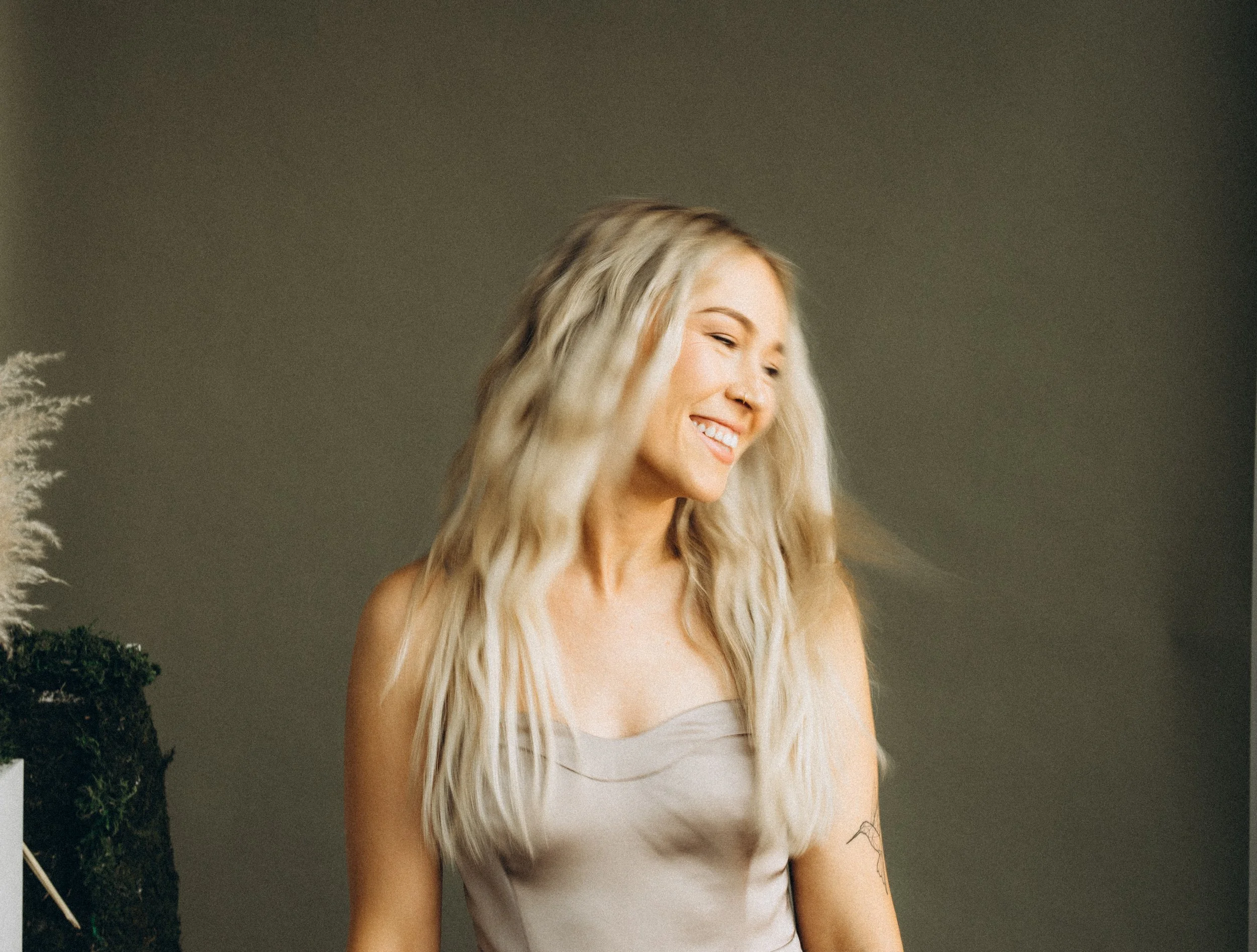 Blurred image of Bridget smiling.jpg