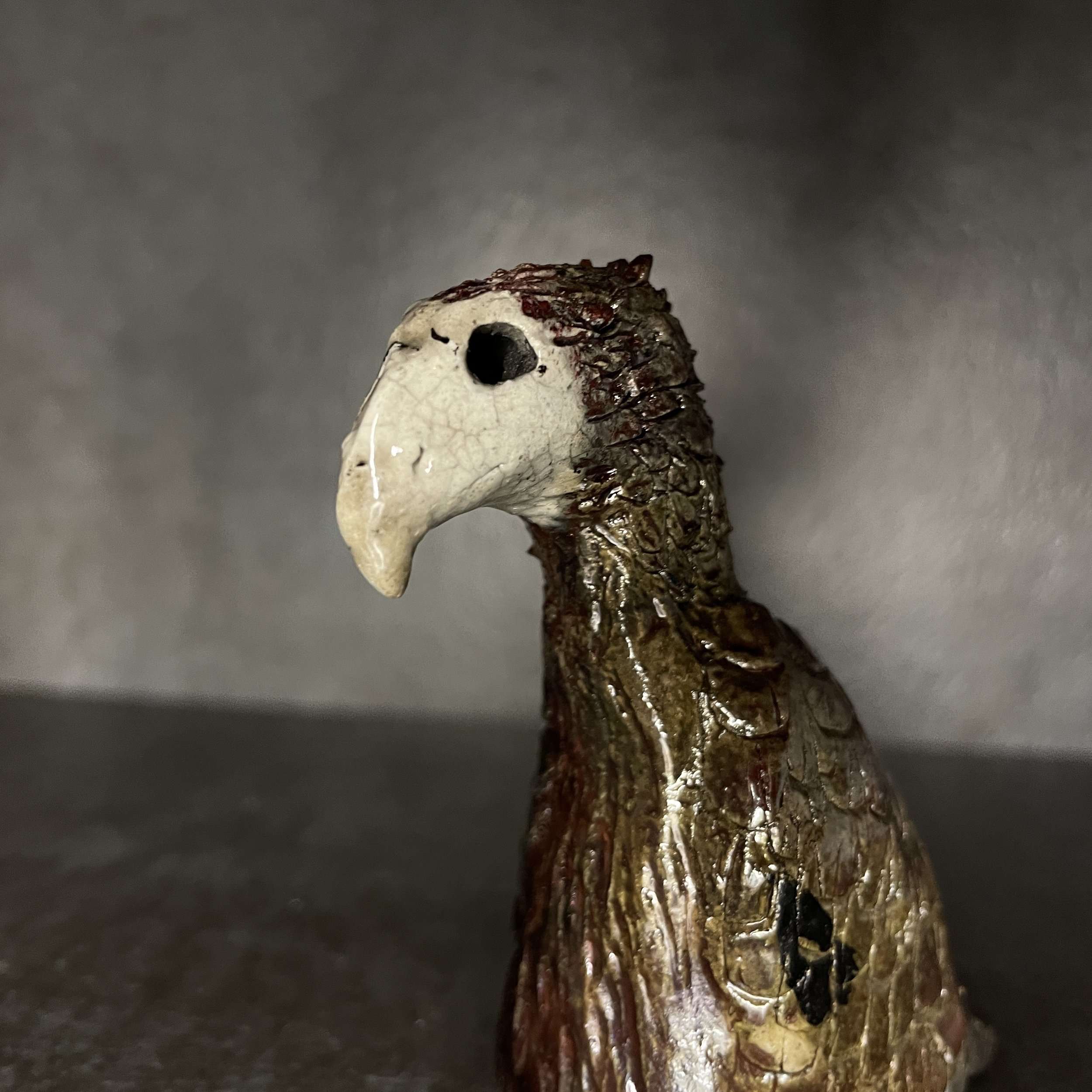 Vulture, raku clay with glaze, 2020