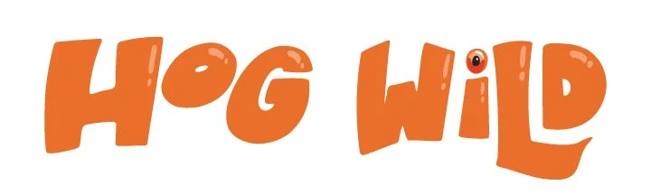 Text that reads 'Hog Wild' in large, orange, stylized letters with a cartoonish eye on the letter 'I'.