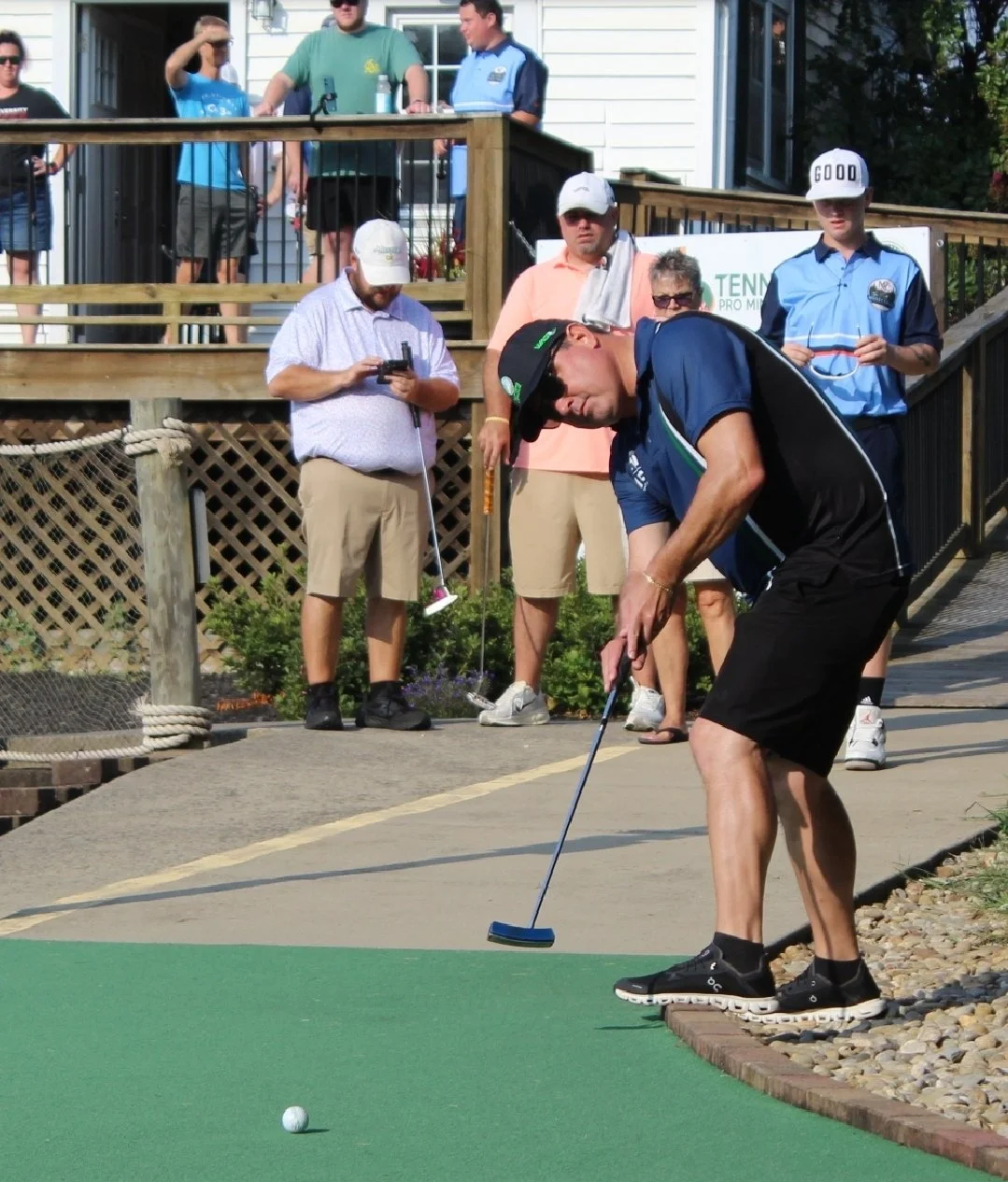 Bryan Akers (Atlanta, GA) tees off on hole 1 at Mossy Creek Mini Golf. Akers finished T19