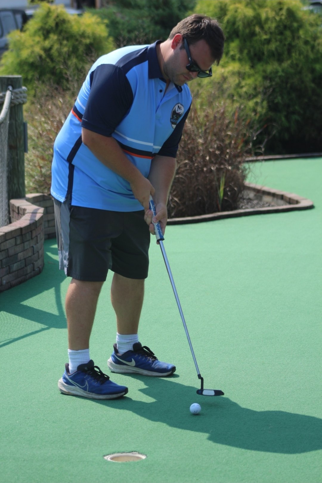 David Lanham finishing a putt