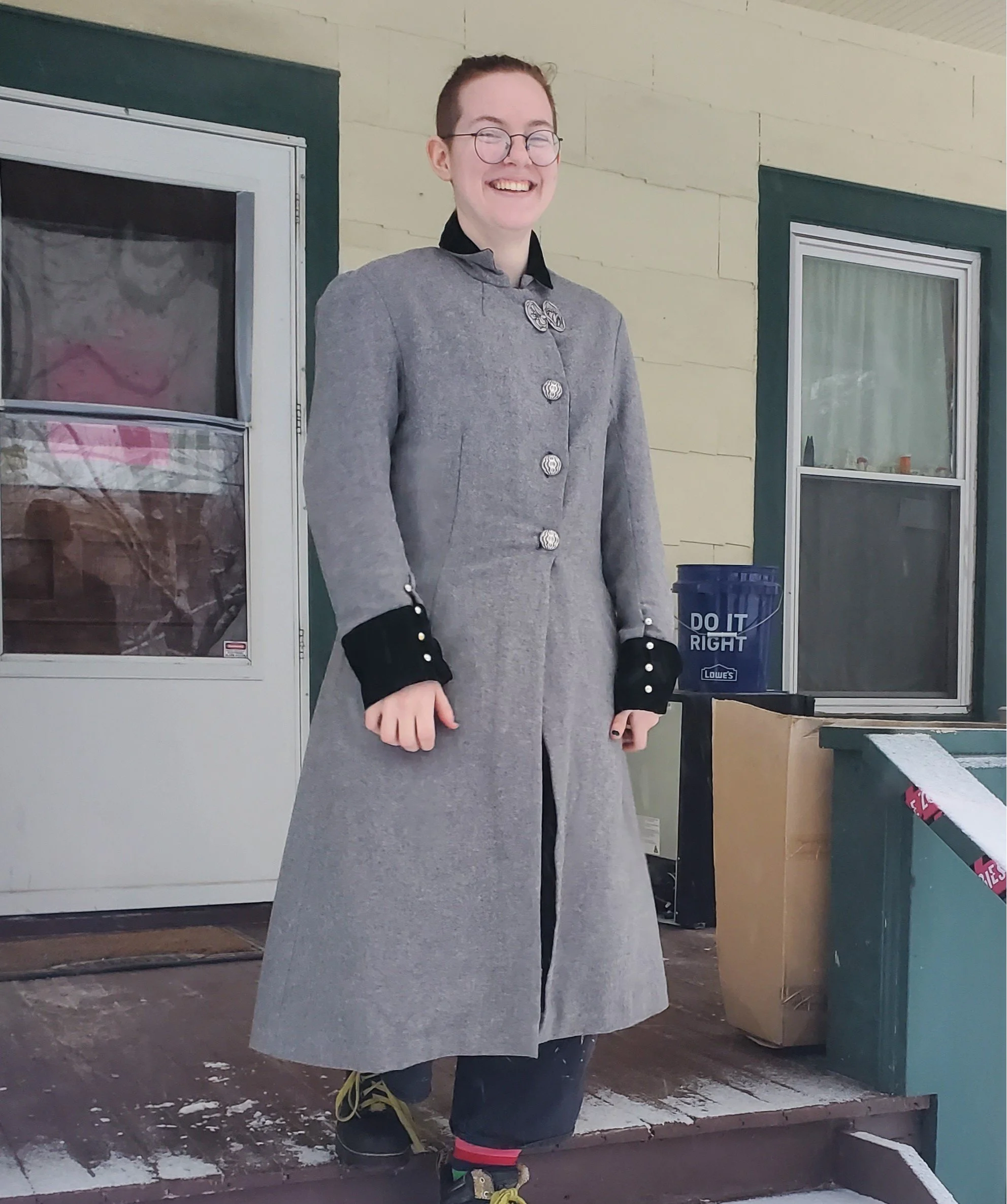 The finished coat is made of a coat-weight wool I got second hand, silk velvet as facings and cuffs, and a heavy silk as a lining. It is therefore very warm.