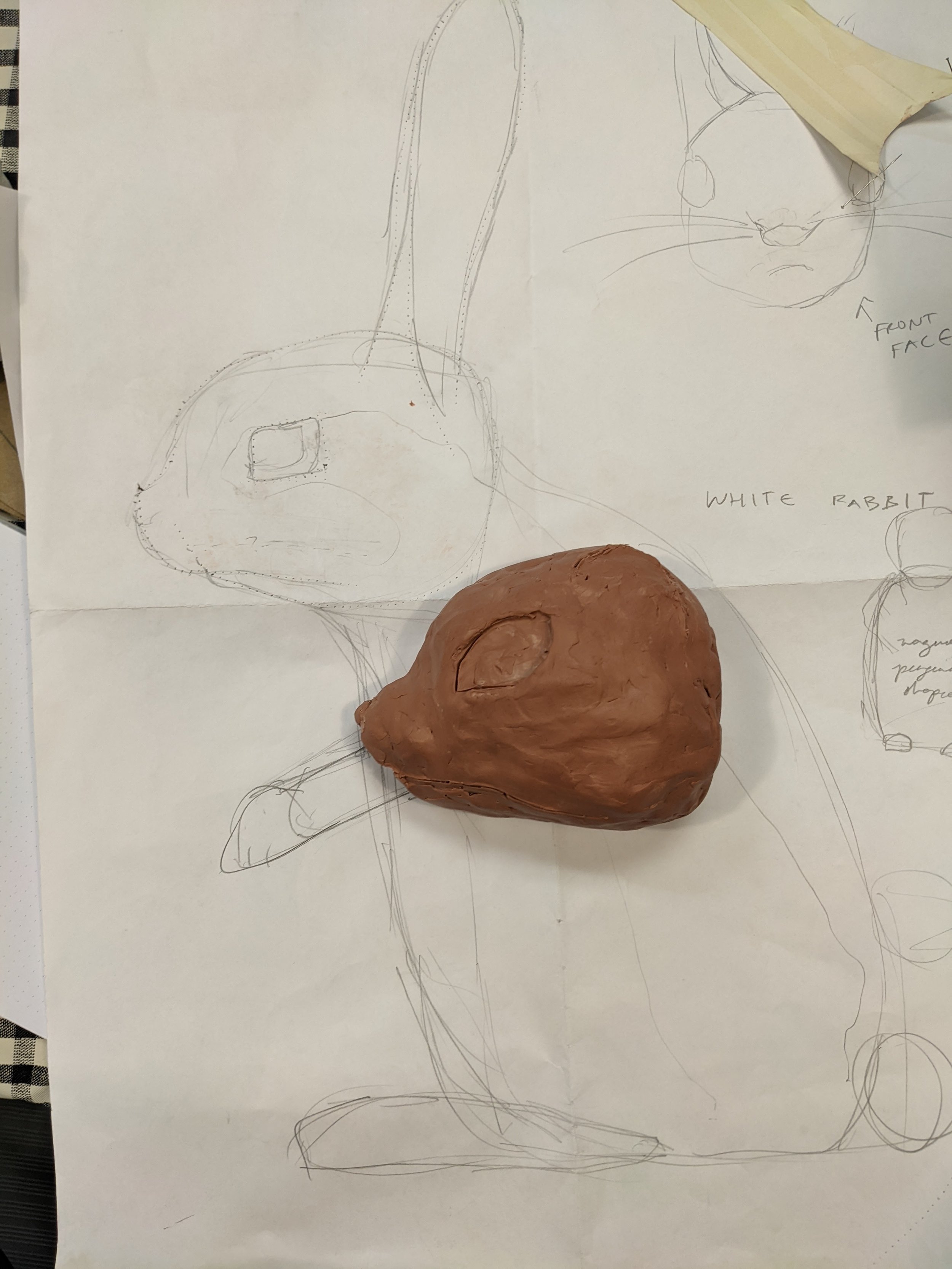 I started the planning process with a to-life sized sketch, and started the foam patterning process with a clay sculpt.
