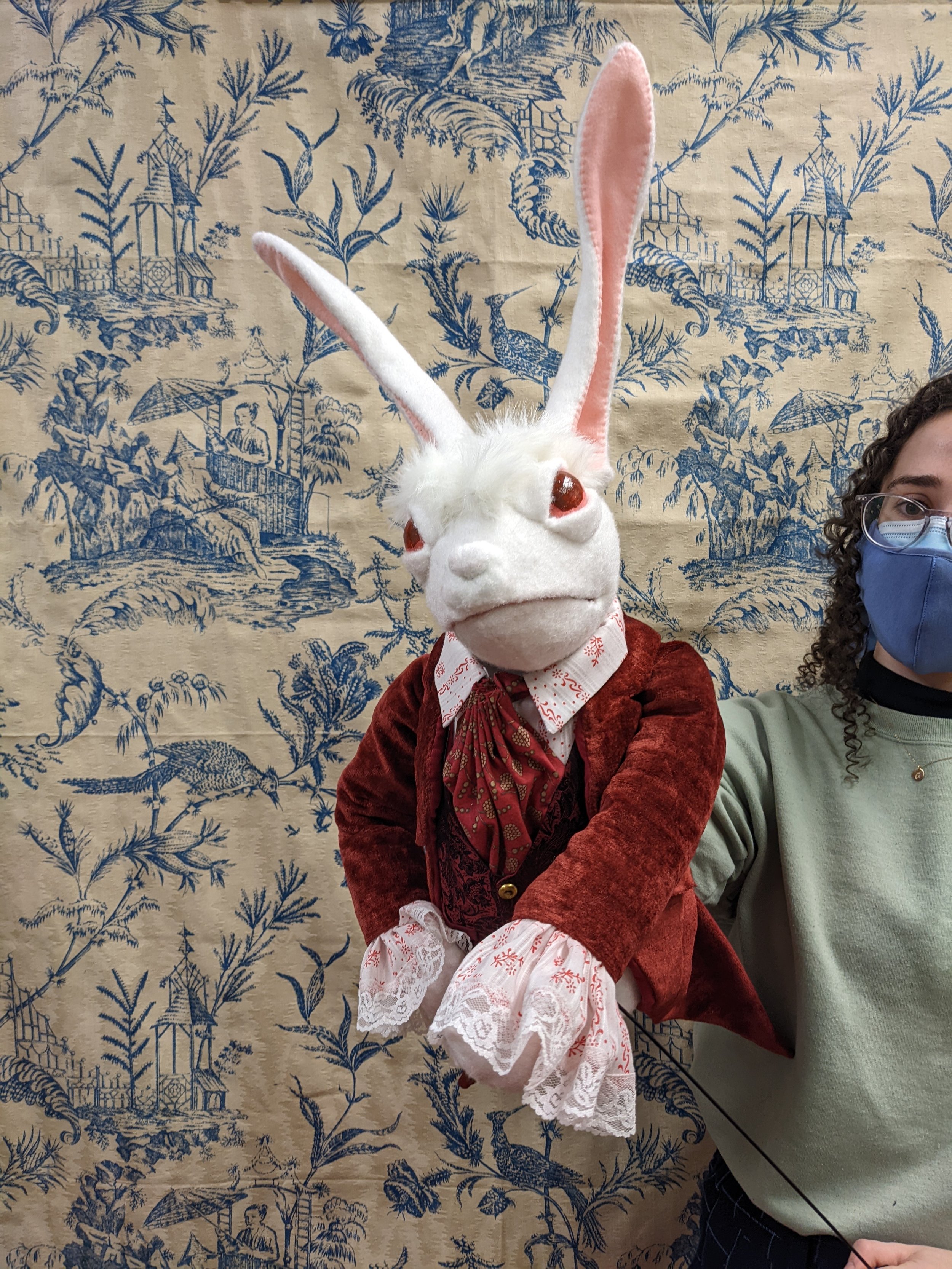 The White Rabbit functions as any other hand-rod puppet, fitting small to medium hands.
