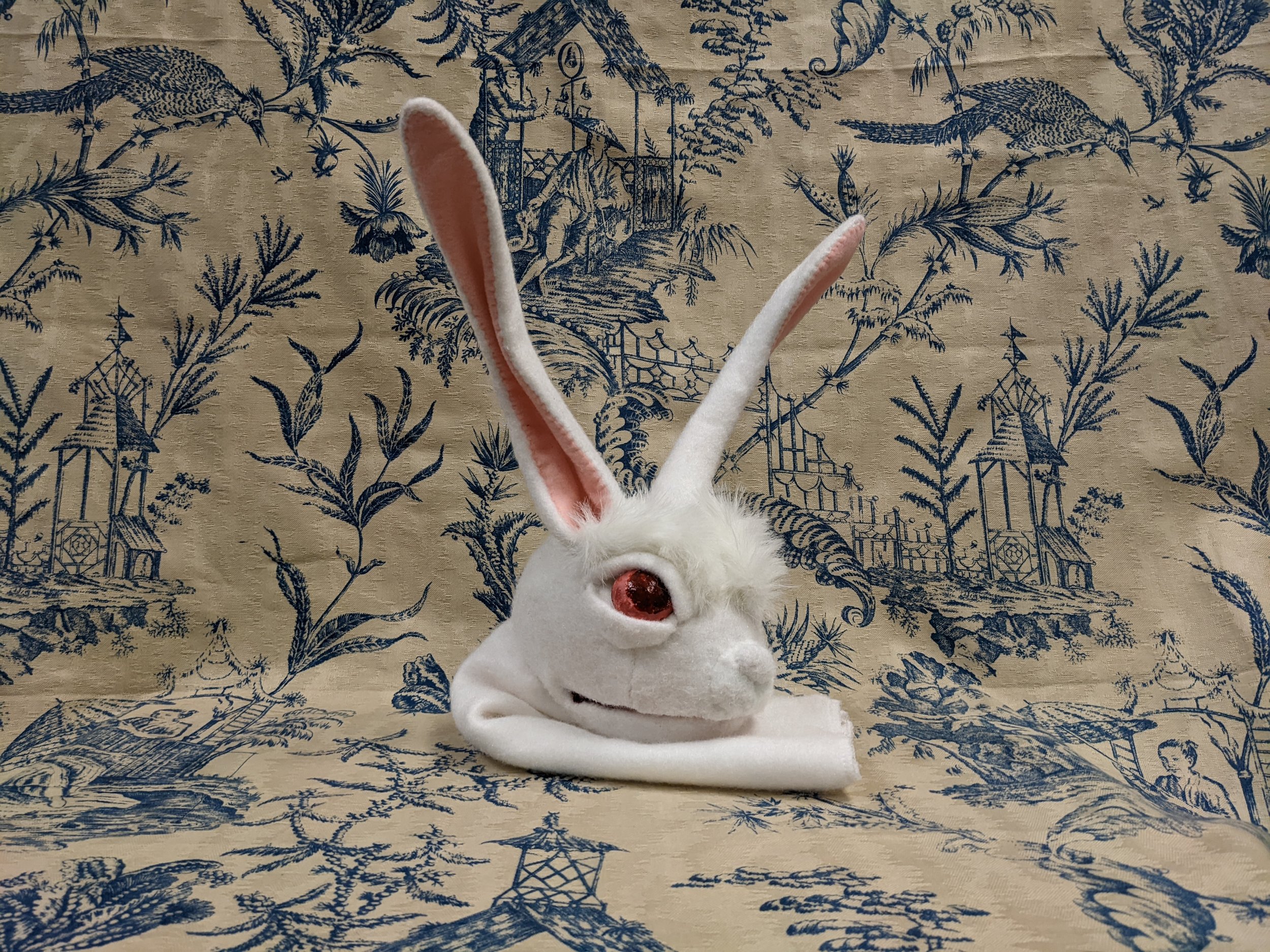 I added eyelids to hold the eyes, eyebrows, the ears, and a neck sleeve to the head.