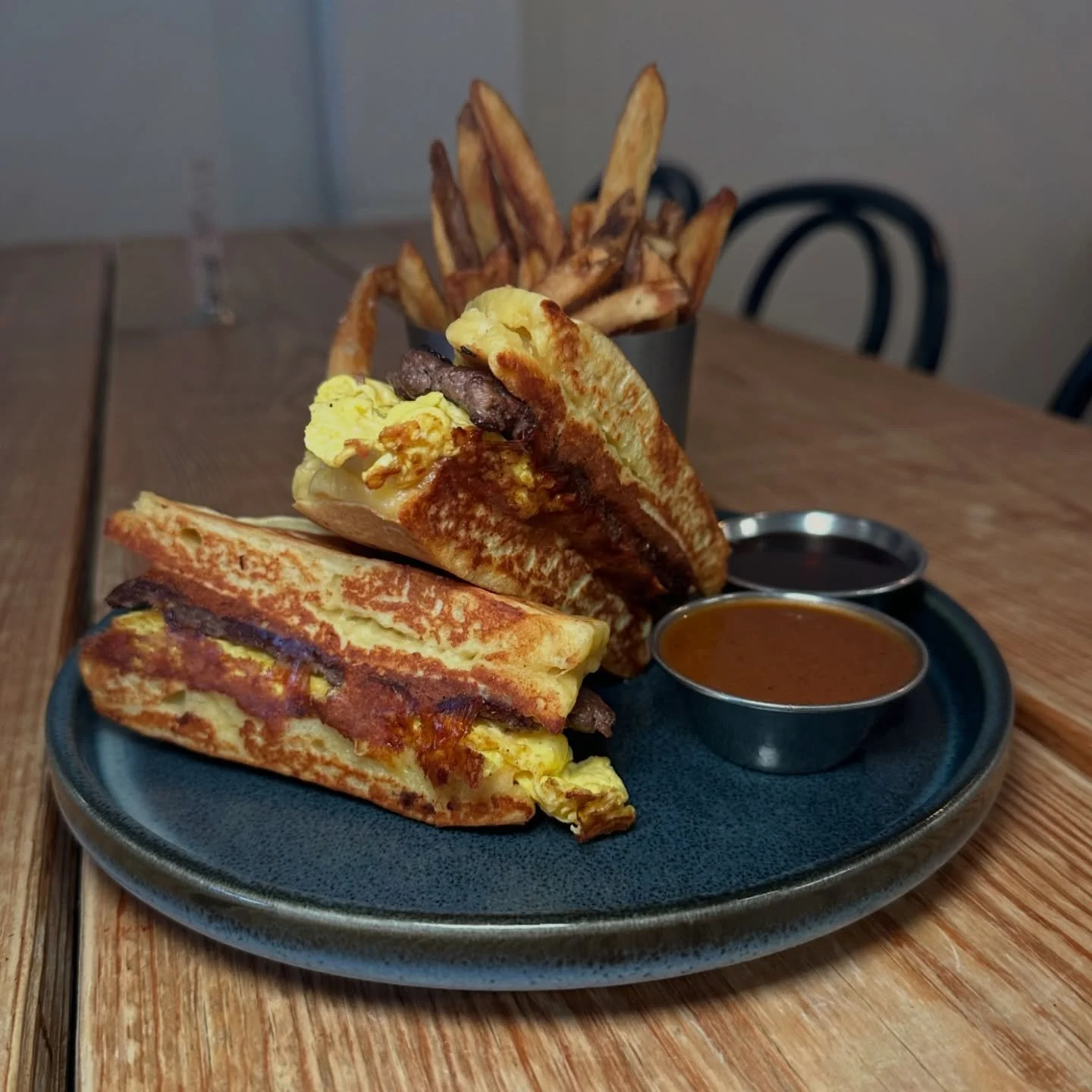 We&rsquo;re open for brunch Saturday and Sunday 10 AM - 2 PM!

Our breakfast sandwich features @funkhouserfamilyfarm eggs, @hurd_well sausage, and american cheese snuggled inside two fluffy pancakes 🥞 served with fries, ketchup and Herring Farms map