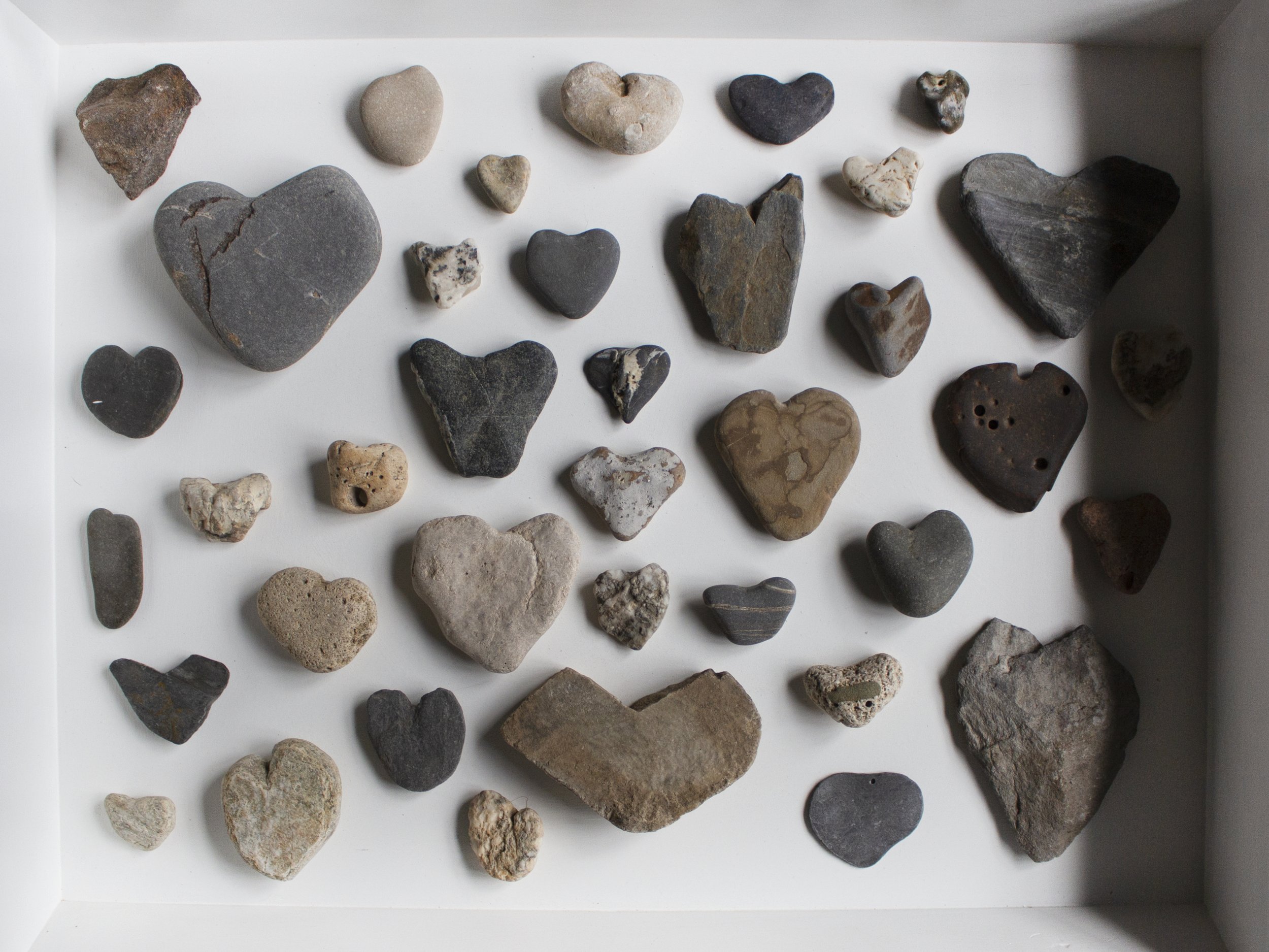 Merle - 'Cabinet Arrangment I (Heart Shape Stones)' (landscape).jpg