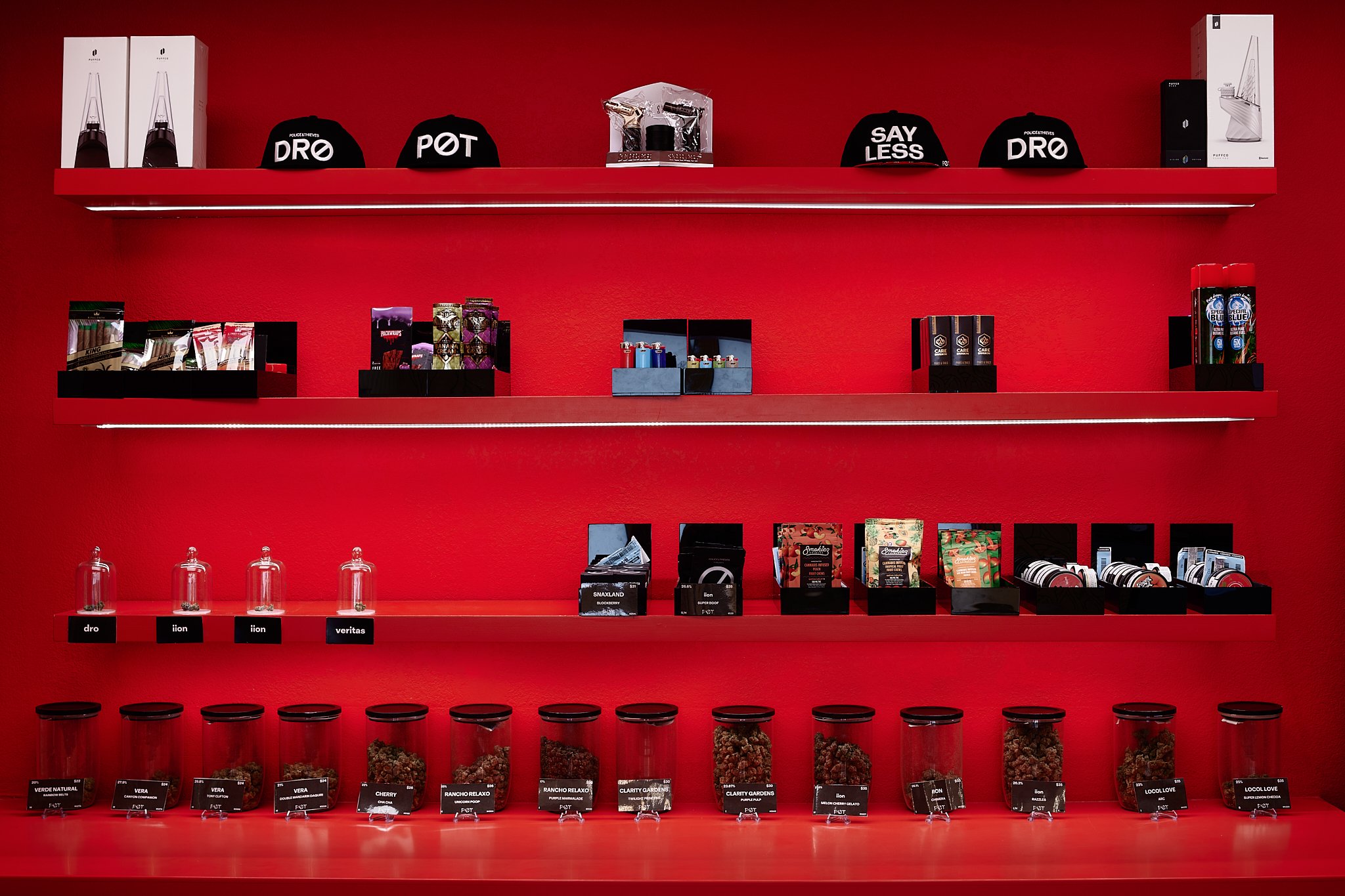 police & thieves - colfax ave dispensary showcase wall