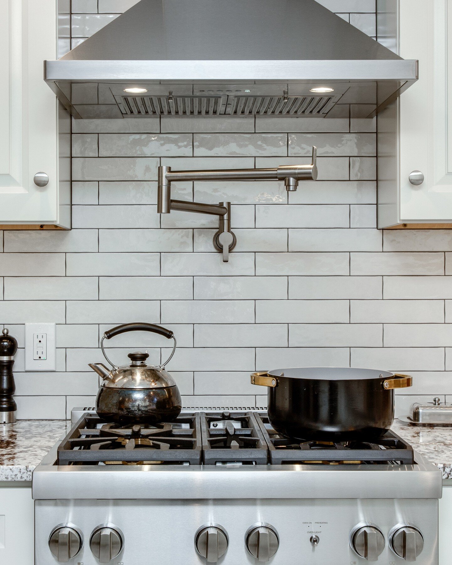 Our client was thrilled with the vent hood and pot filler! He uses it every day!