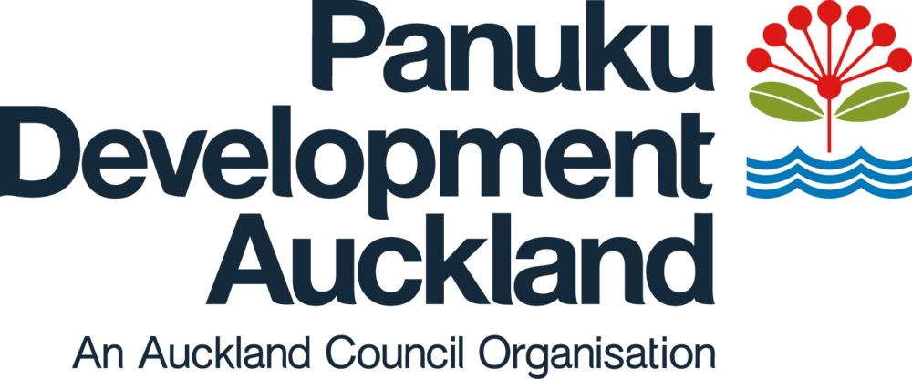 Logo of Panuku Development Auckland featuring a red and green stylized flower above blue wavy lines. Text reads: "Panuku Development Auckland, An Auckland Council Organisation."