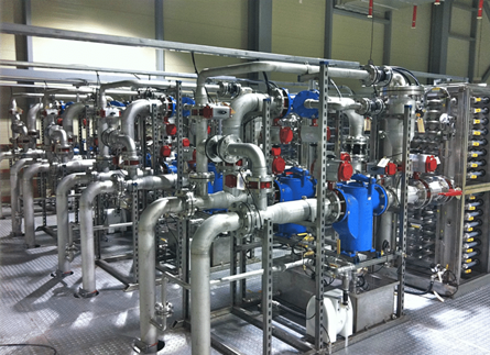 Industrial piping system with metal pipes and blue valves