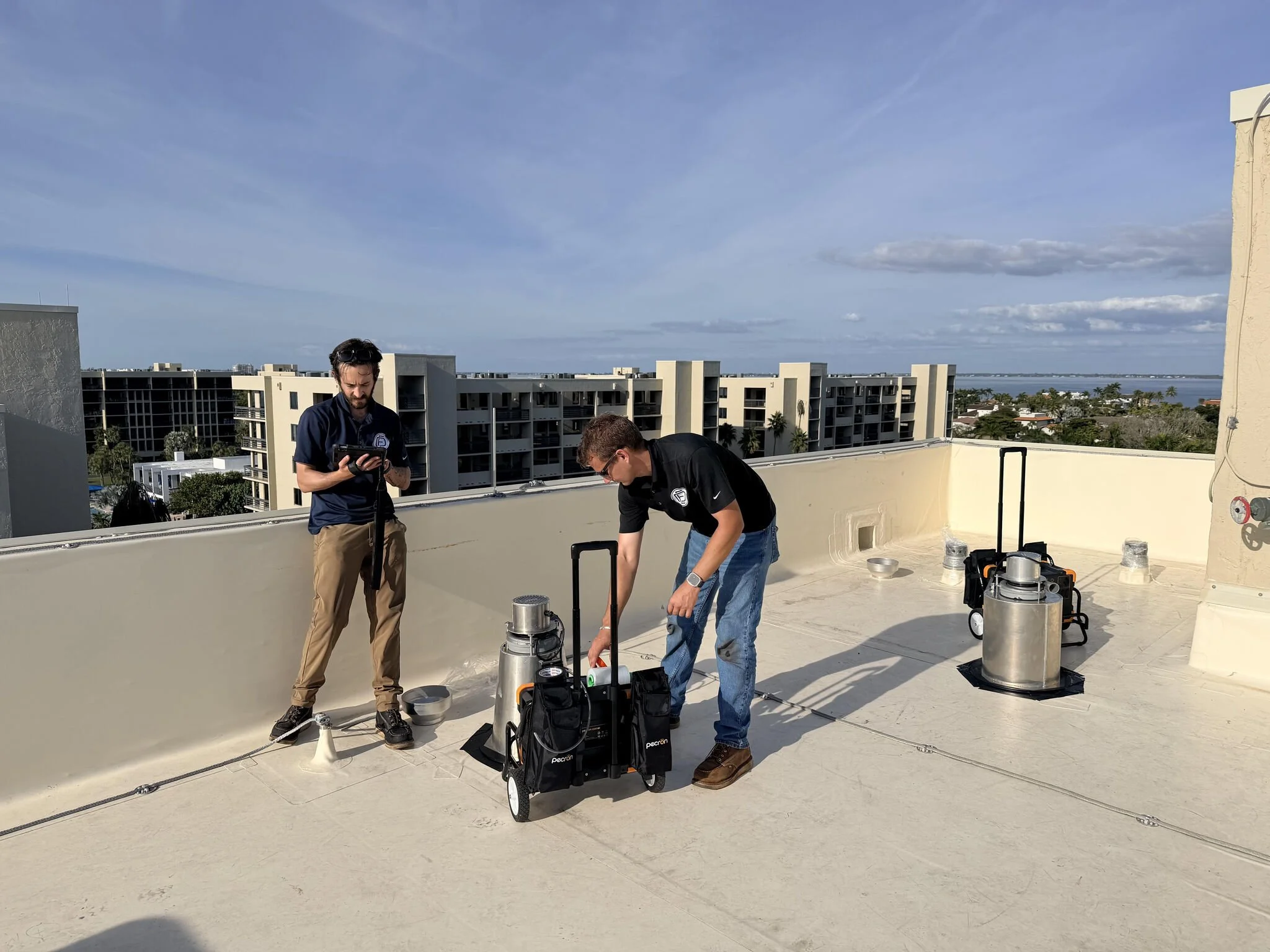 Dynamic Engineering Design & Inspection Team using their Vortex Vaults to test an ERC Wind Vent roof system.