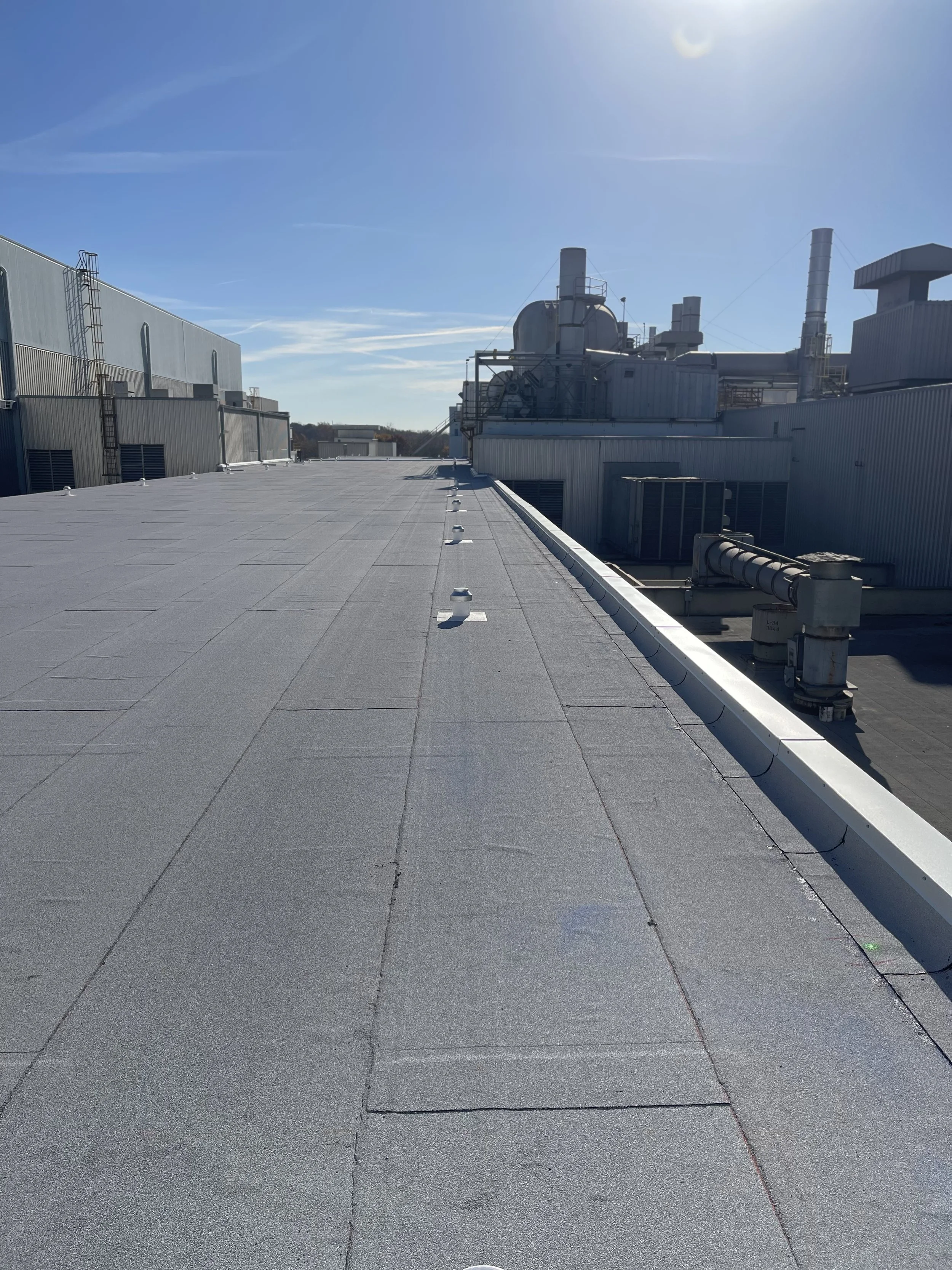 A modified bitumen Wind Vent system over an industrial plant