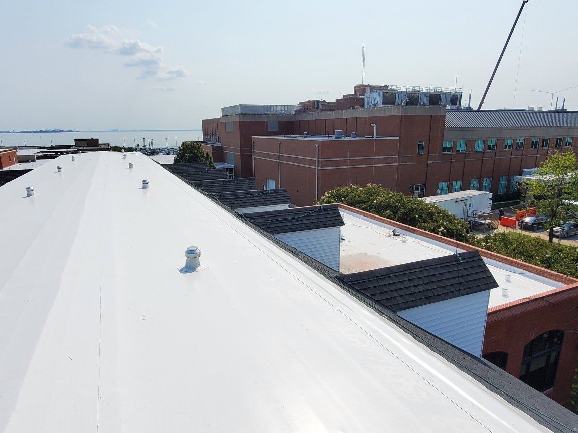 Low-slope single-ply pvc roof system over a healthcare facility