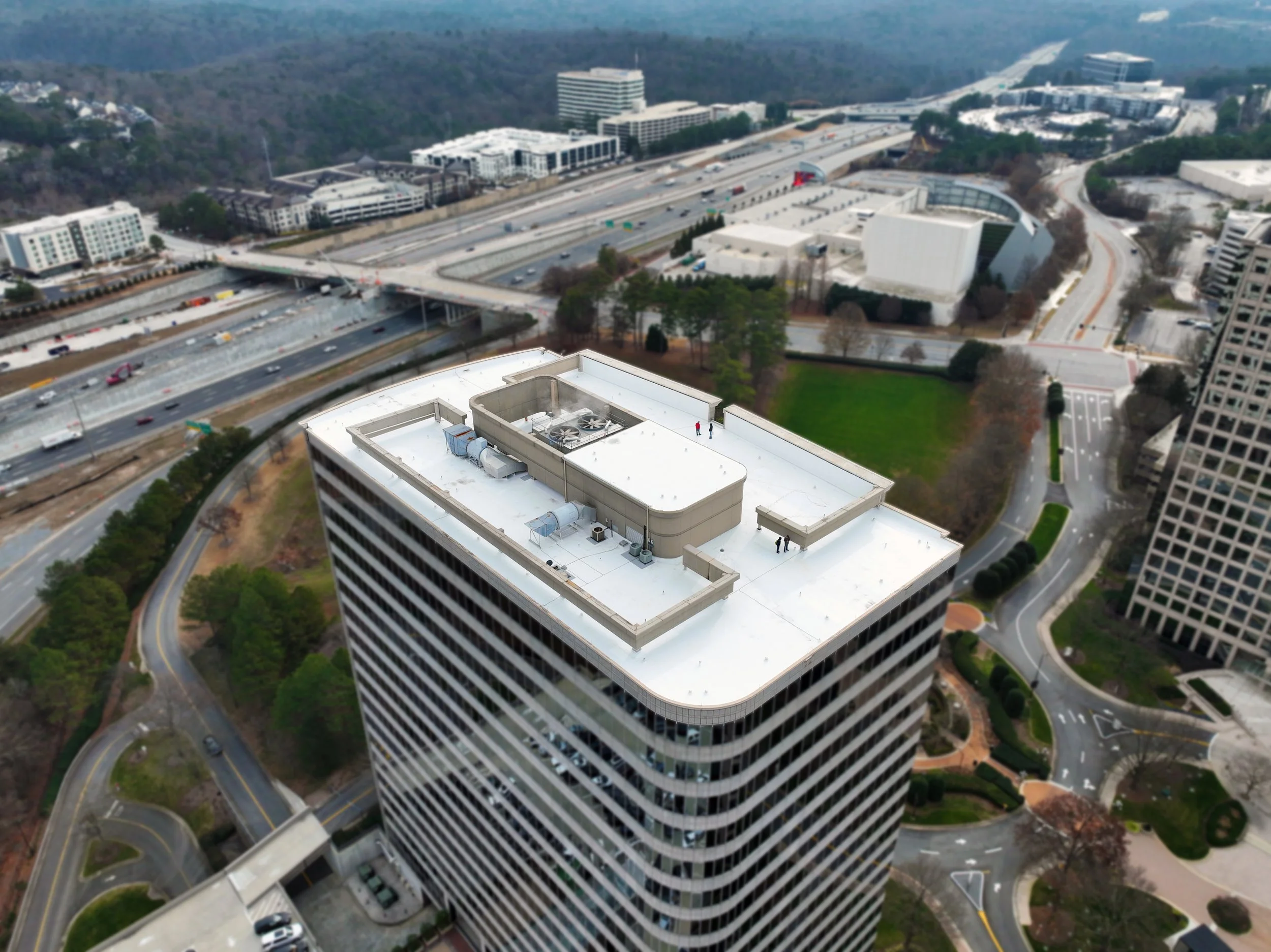 Aerial view of the Atlanta 400 Skyscraper with a new PVC Single-Ply Wind Vent Roof.