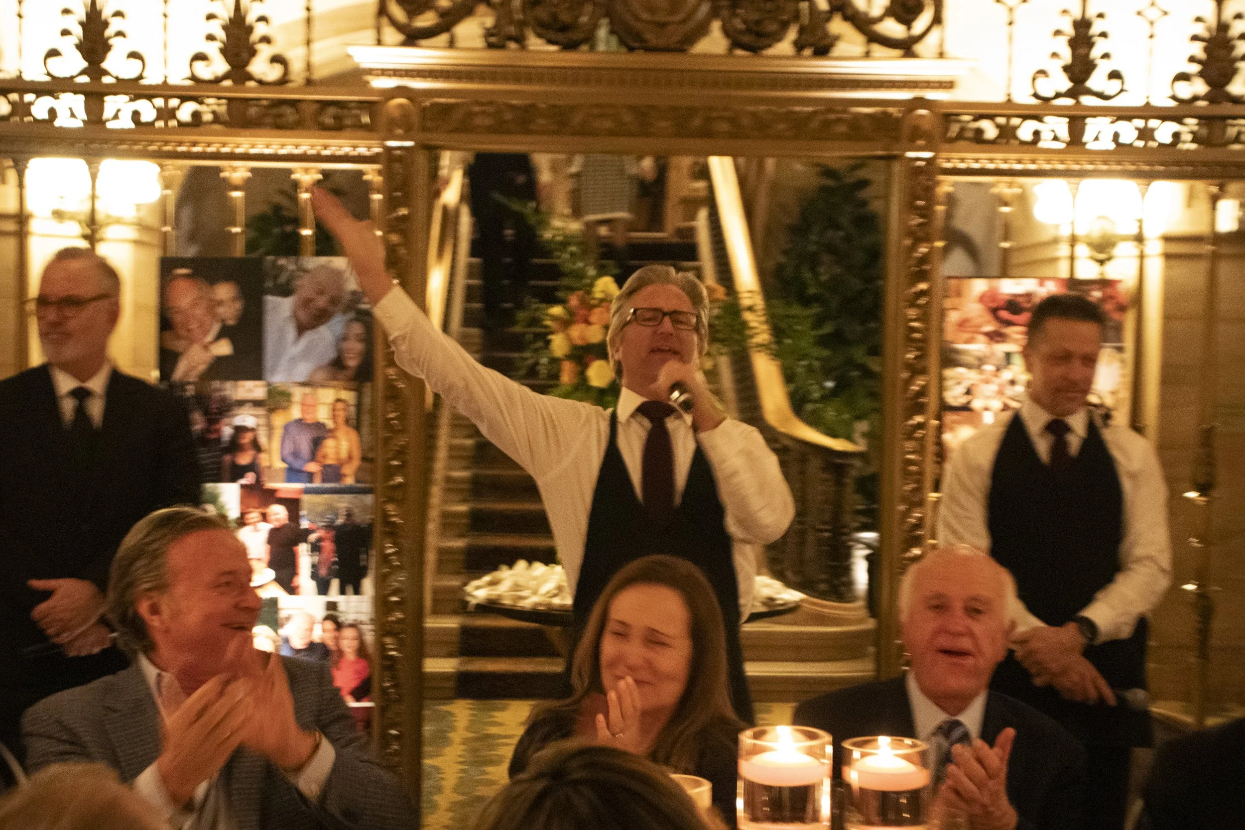 Singing waiters performing during Richard’s 80th birthday celebration at Marble Room