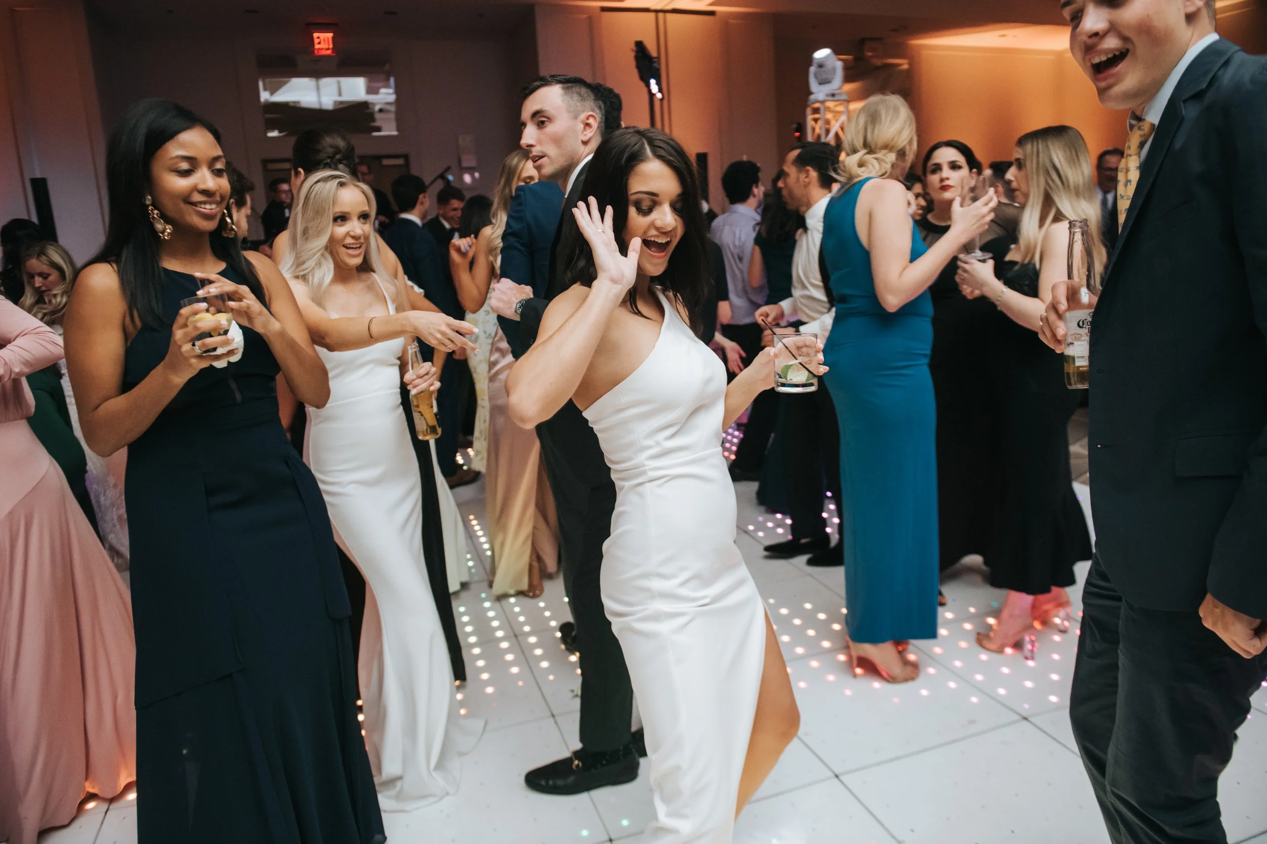 Wedding guests enjoying cocktail hour at Northeast Ohio celebration planned by Sterling Event Services