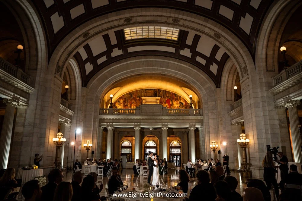 Wedding setup beneath the arches and marble staircase at Cleveland’s Old Courthouse