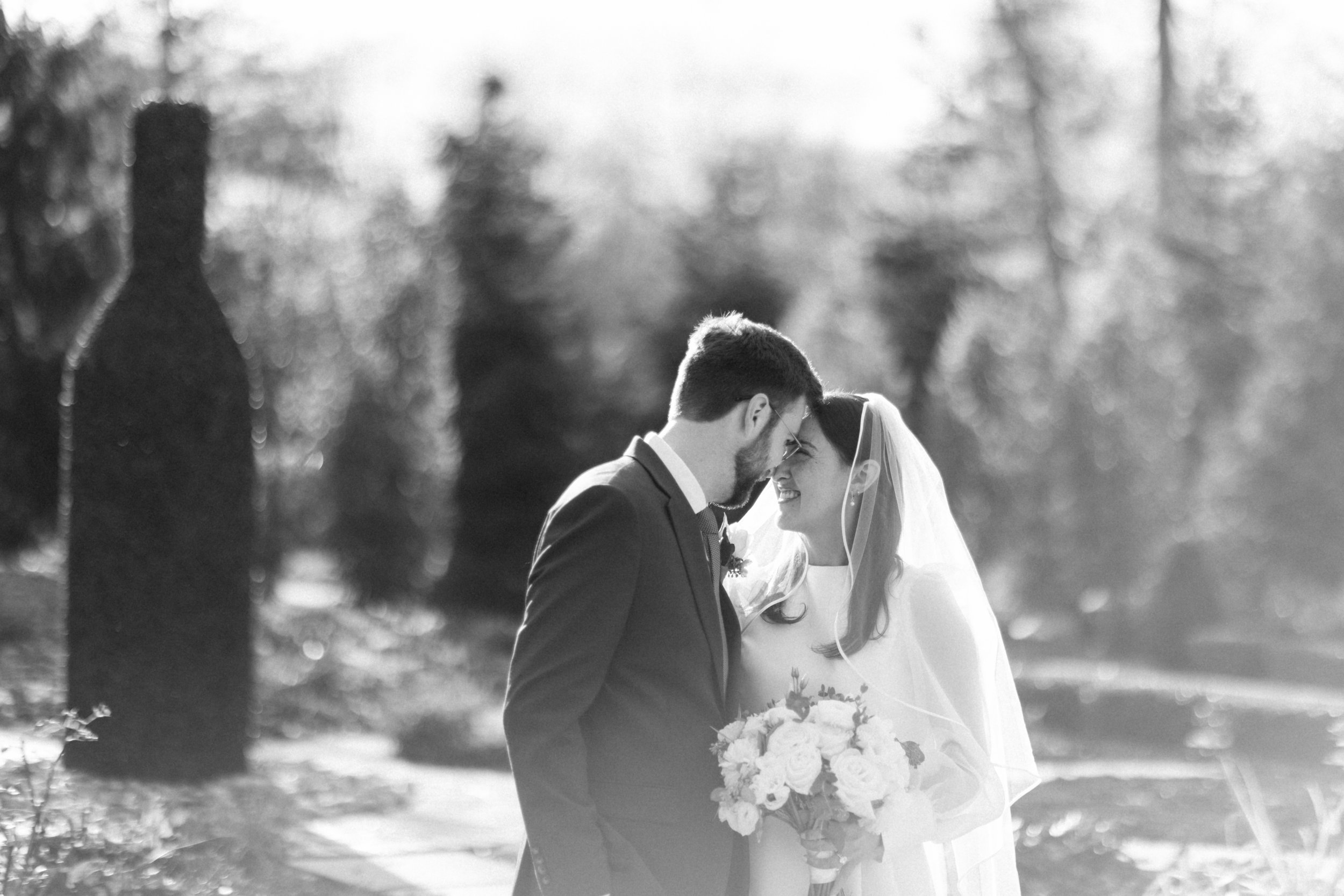 Courtney and Reed sharing a quiet moment during their fall wedding at Cru Uncorked.