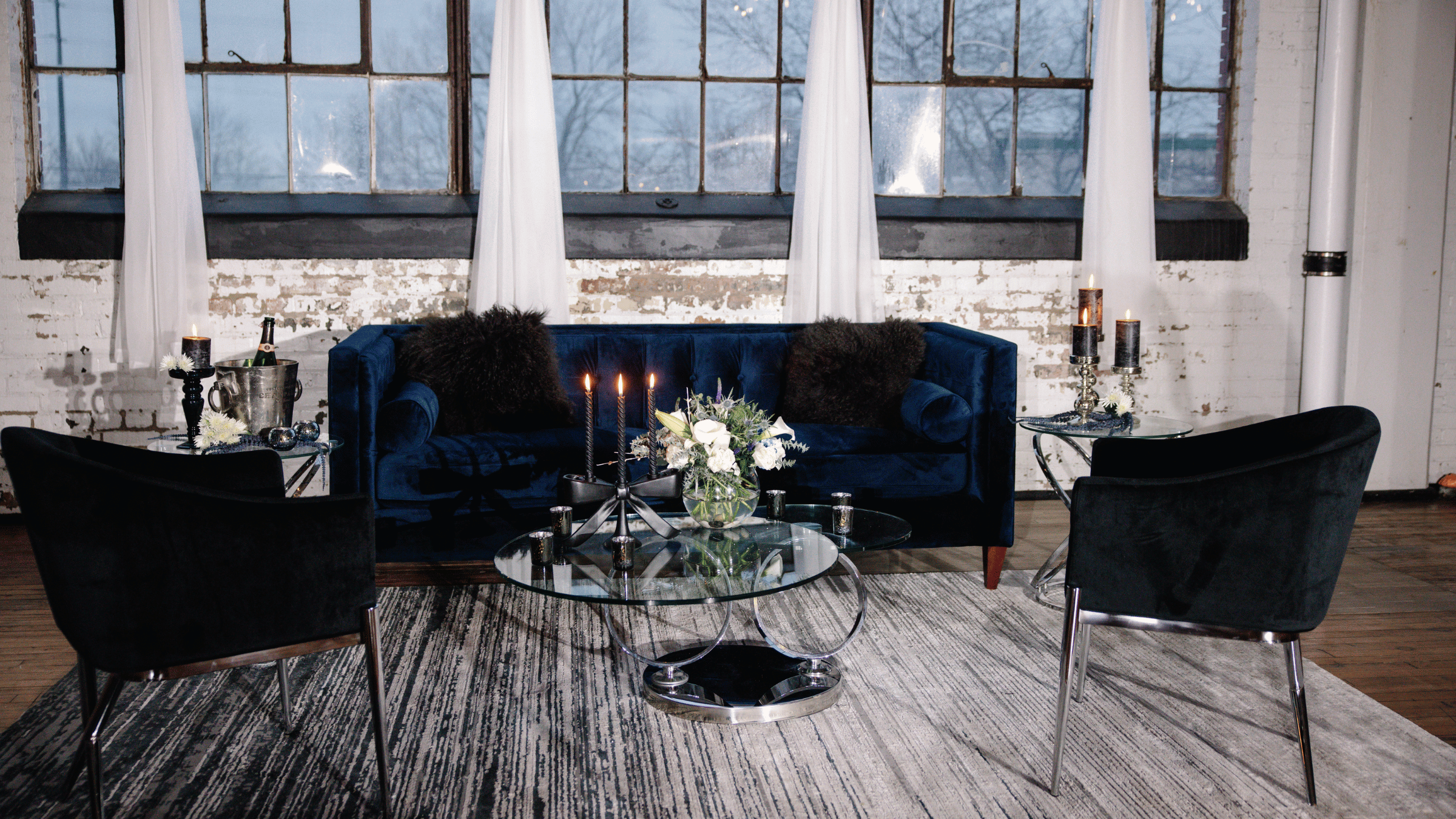 Reputation era dramatic wedding Cleveland - black and gold design, burgundy florals, cinematic lighting by Sterling Event Services