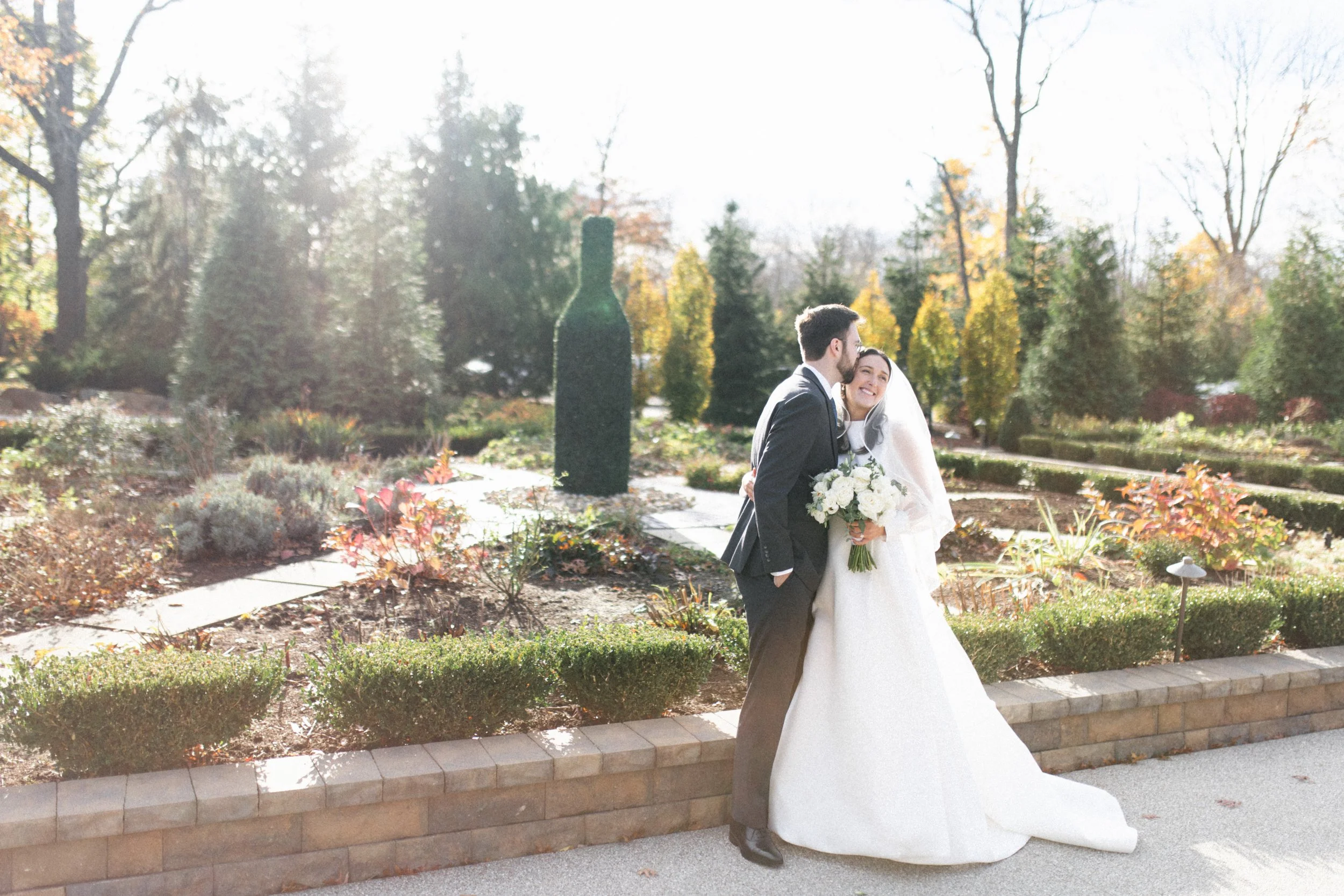 Courtney and Reed outside Cru Uncorked during their fall wedding in Moreland Hills, Ohio