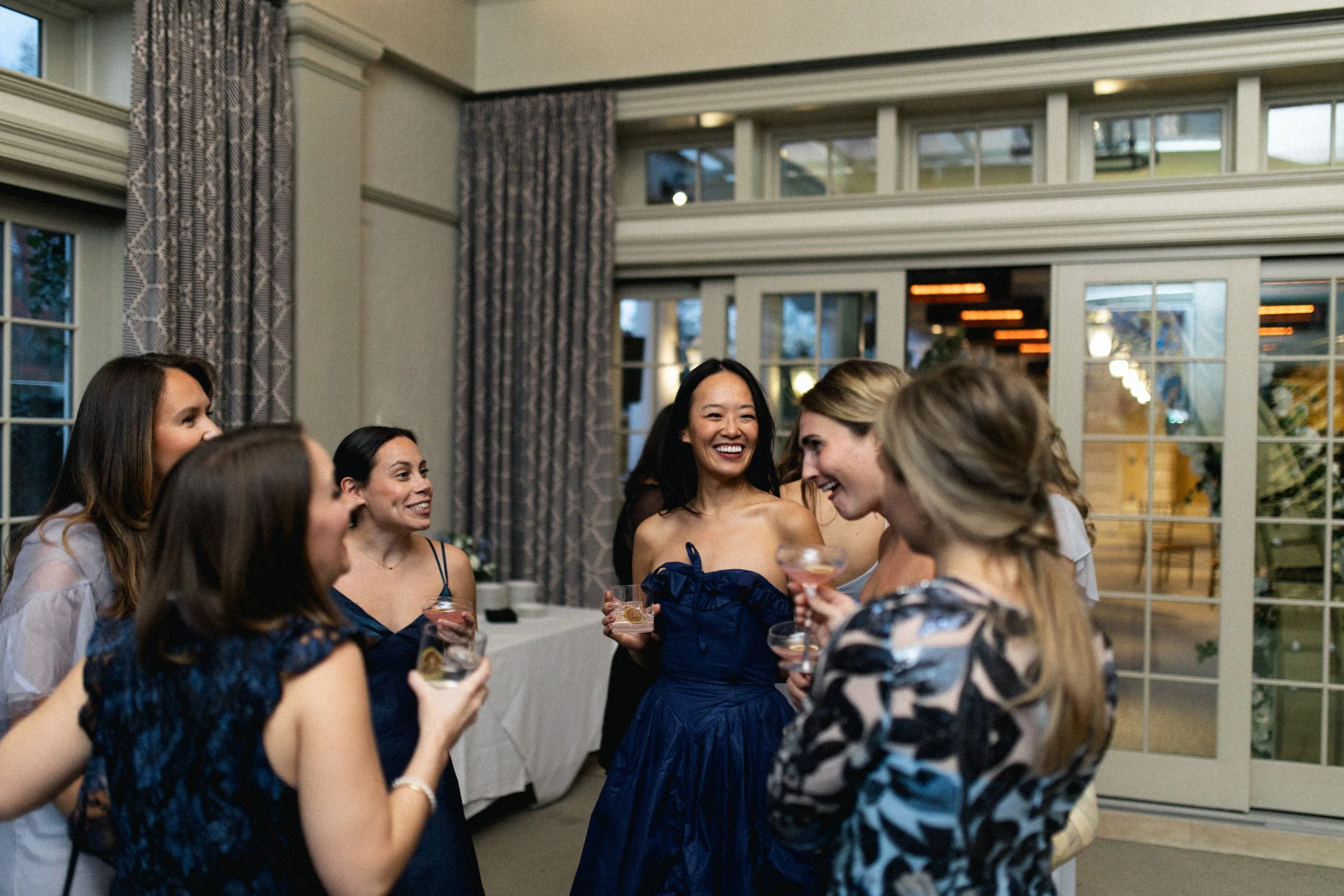 Guests enjoying Courtney and Reed’s fall wedding reception at Cru Uncorked.