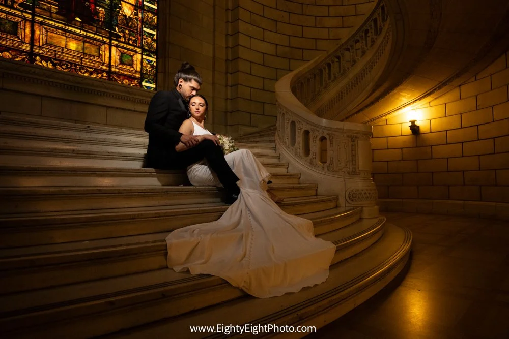 Becca and Jake on the grand staircase at the Old Courthouse in Cleveland
