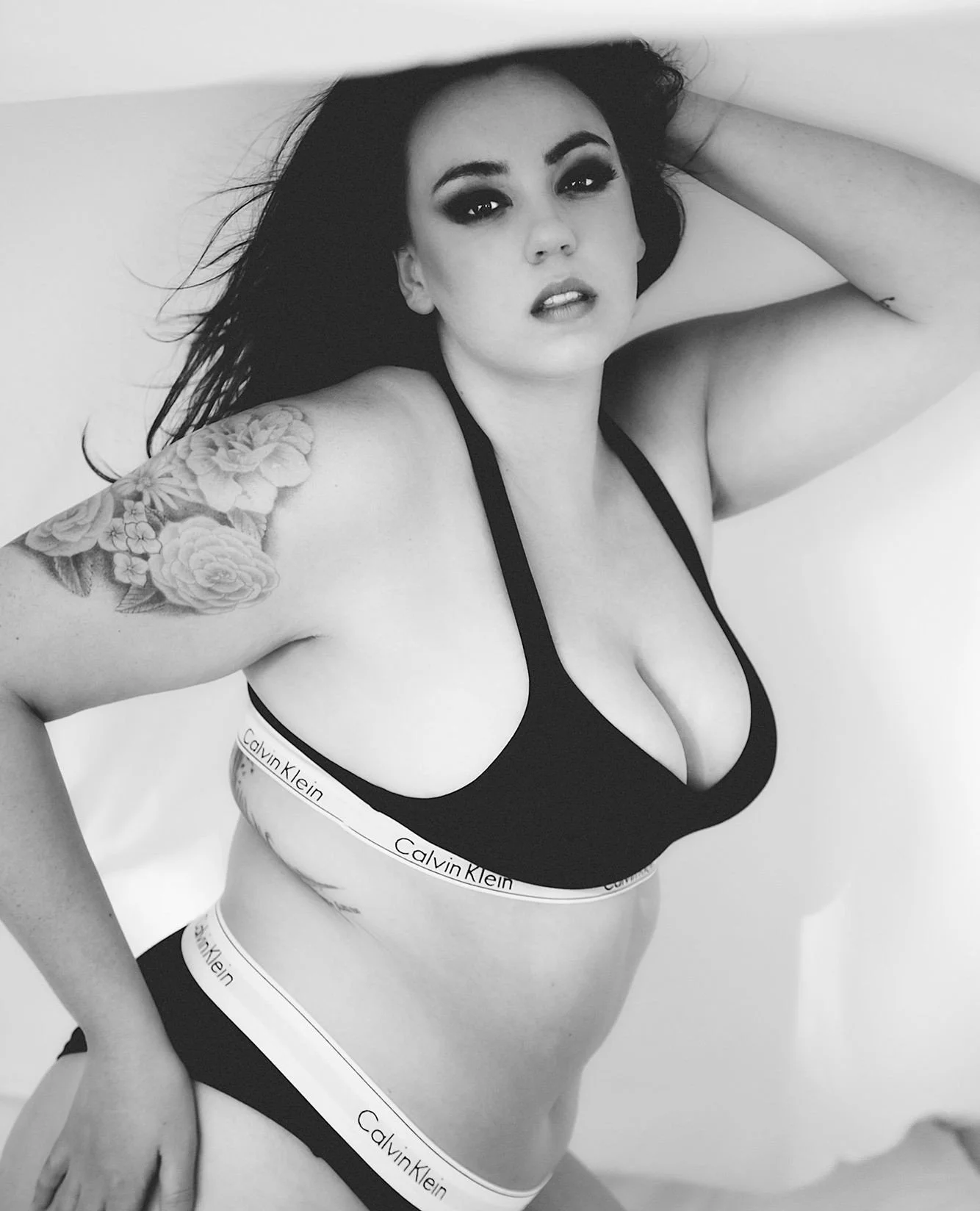 This Calvin Klein set is so classic and clean looking for this windswept shot. We pull the sheet all the way up and stick the fan in to create a billowing airy effect that makes the light so pretty and gives us a little natural roof to play with as t