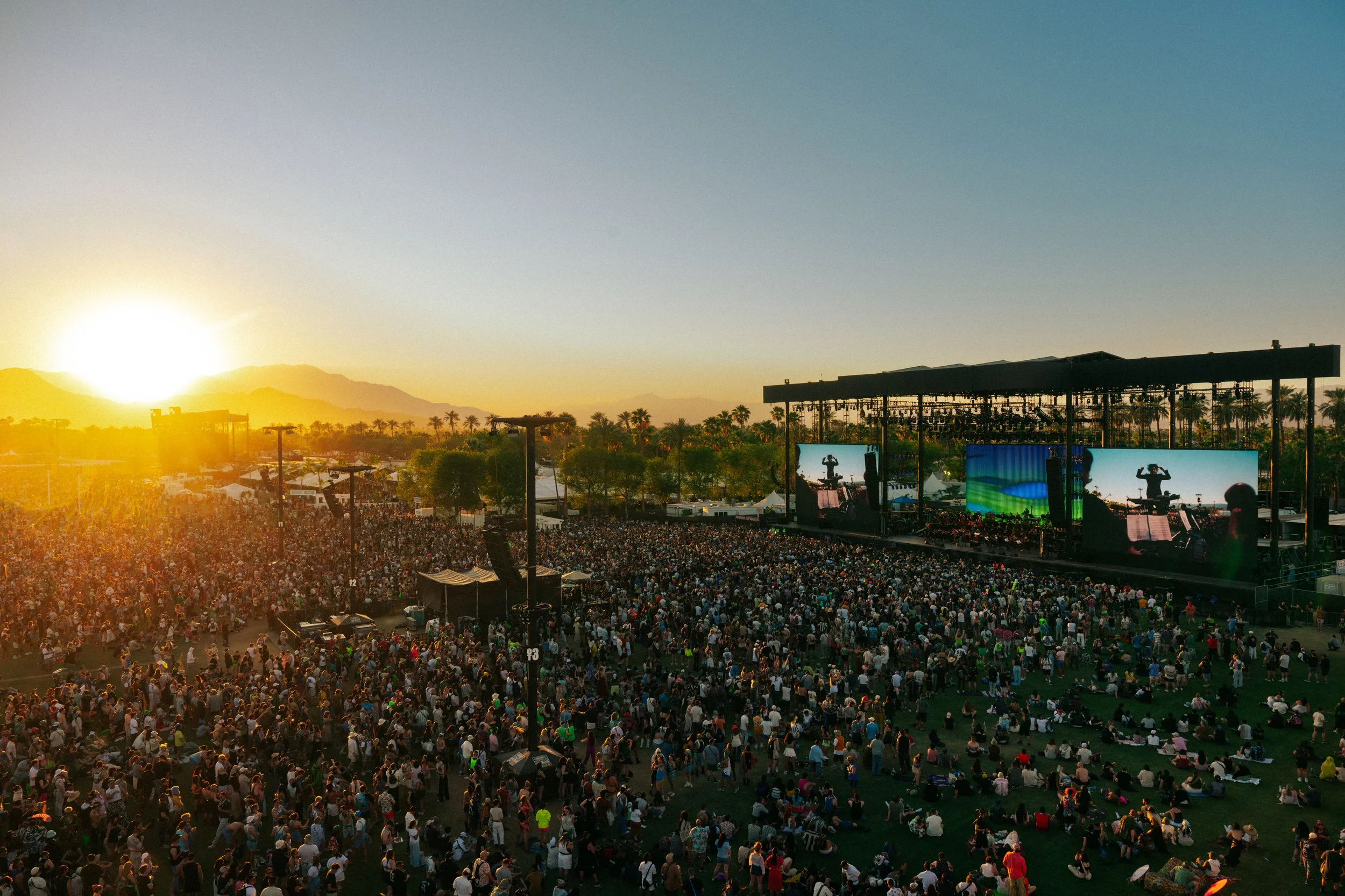 LA Philharmonic performing at coachella outdoor stage during sunset