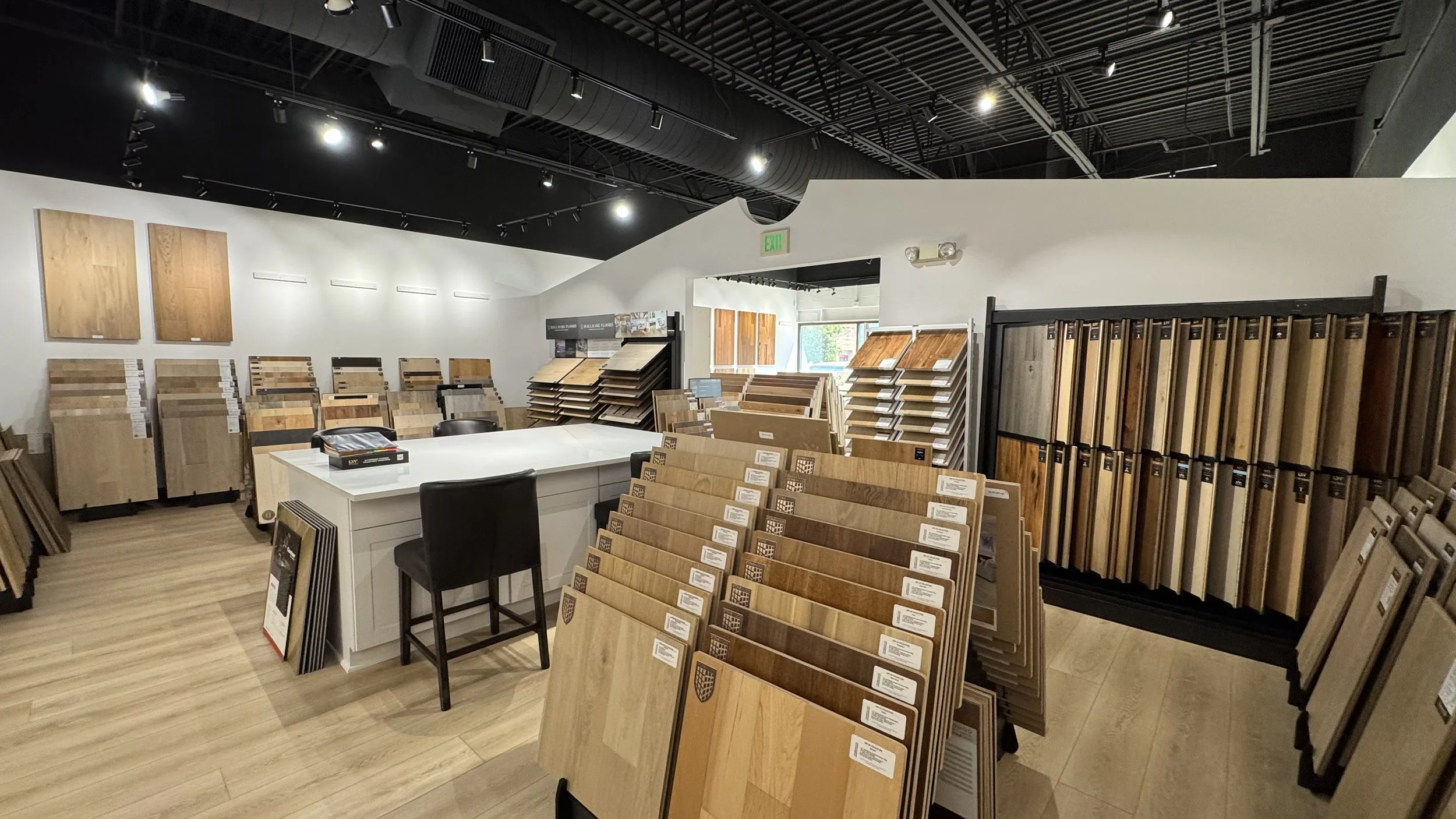 Express Hardwood & Flooring Centennial showroom in Centennial, CO featuring site-finished hardwood, engineered hardwood, luxury vinyl plank, and laminate flooring displays