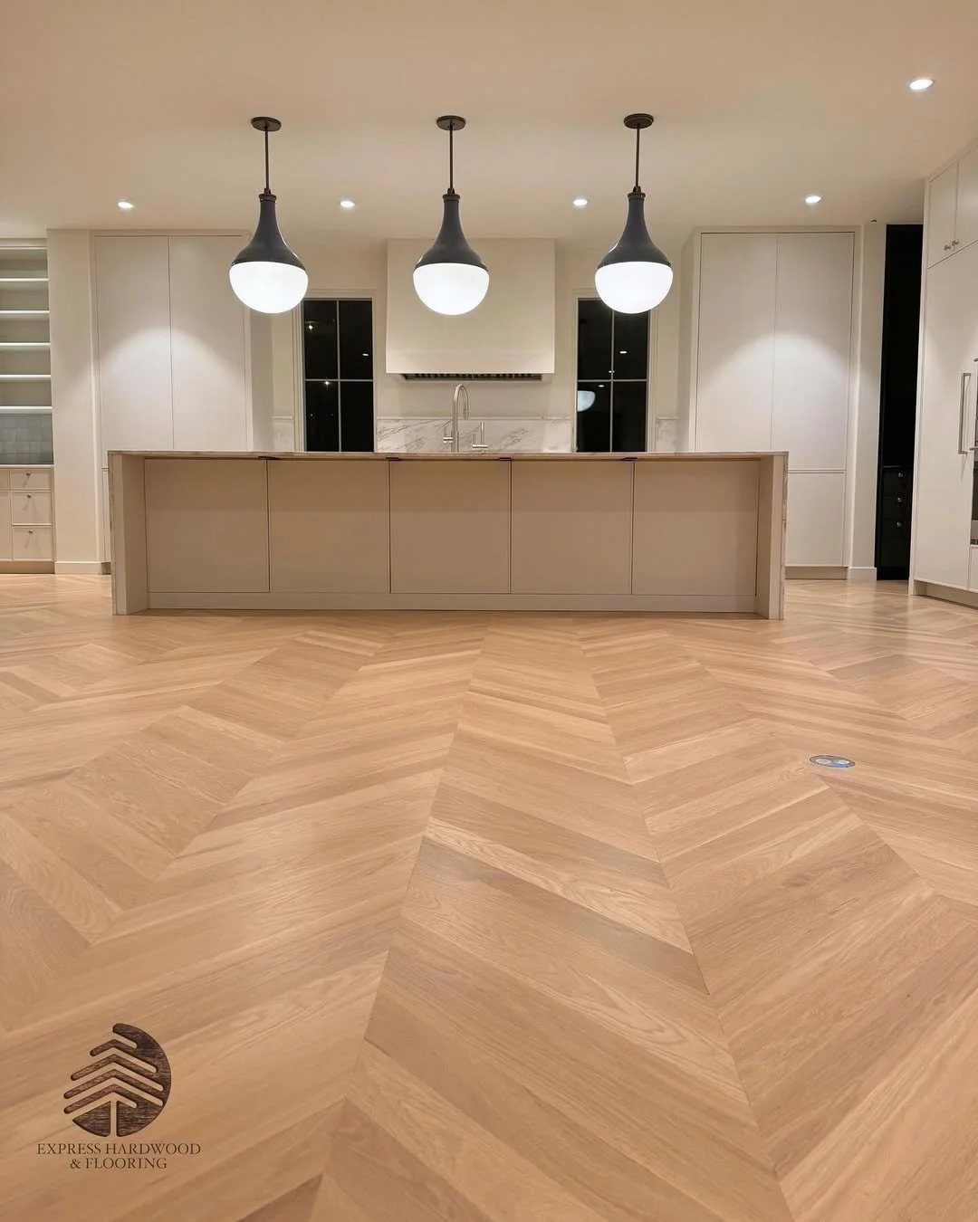 Red Oak natural chevron hardwood flooring with warm tones and detailed wood grain