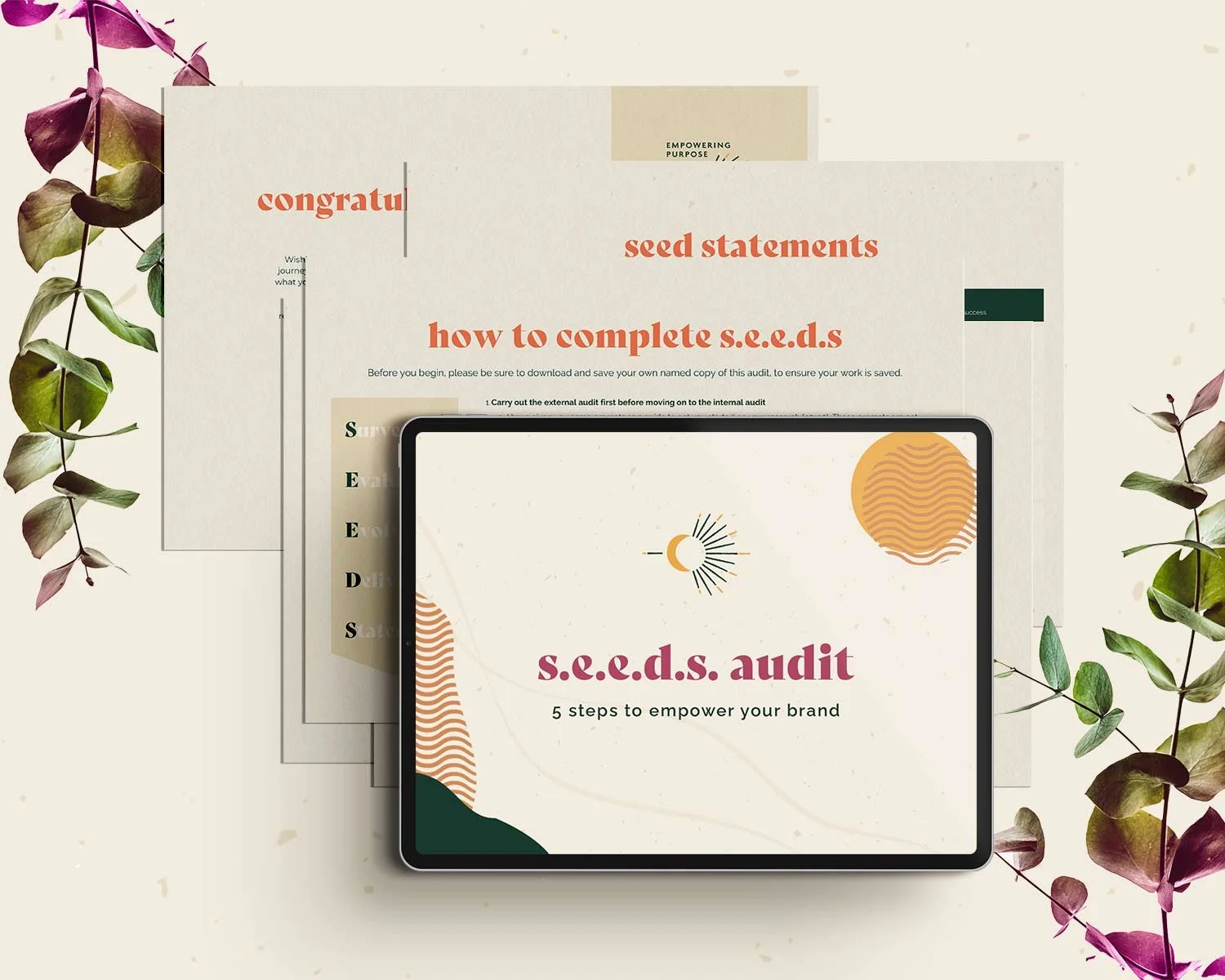 Tablet displaying "s.e.e.d.s. audit: 5 steps to empower your brand" overlaid on documents with headings like "seed statements." Surrounded by decorative leaves.