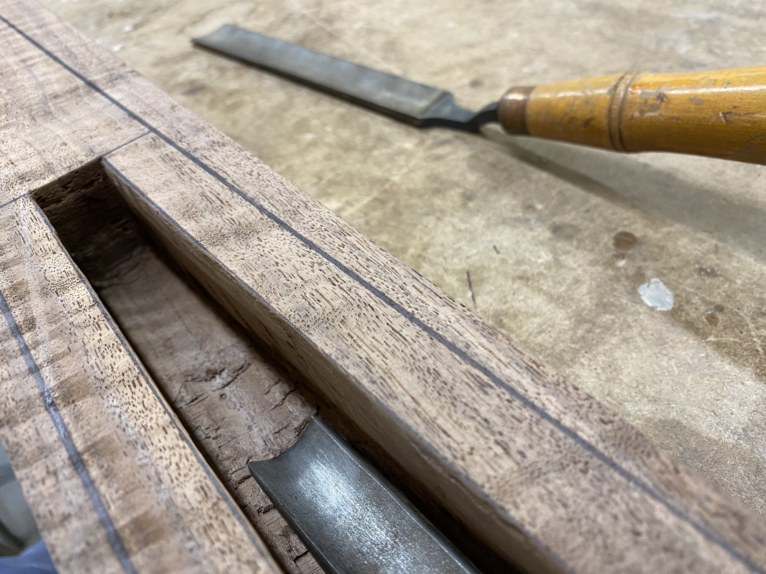 carving out the bottom of the electronics cavity