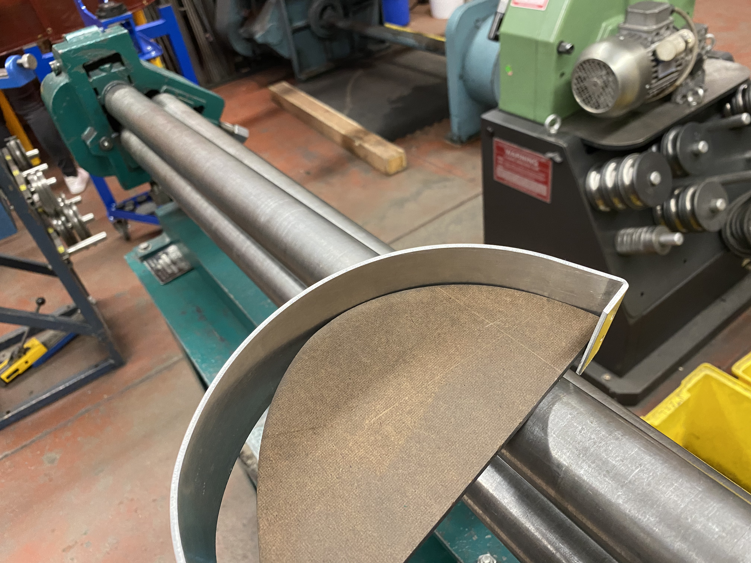 iteratively forming sheet metal curves w/ slip roller