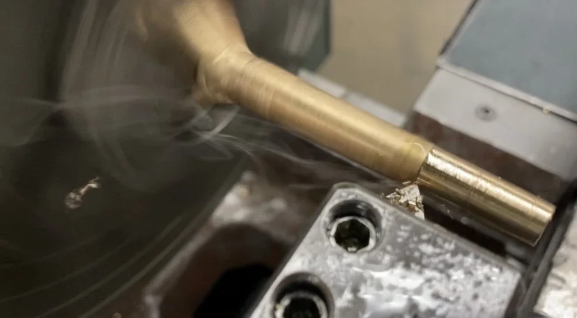 cutting taper of tuning peg shafts using the lathe w/ taper attachment