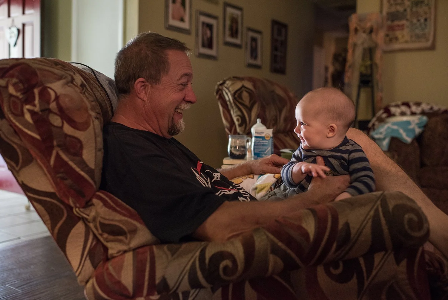 Four-month-old Dawson lights up as he sees his Grandpa for the first time that evening. “I feel such a bond with Dawson. I was the only one who could get him to sleep in the middle of the night,” says John.