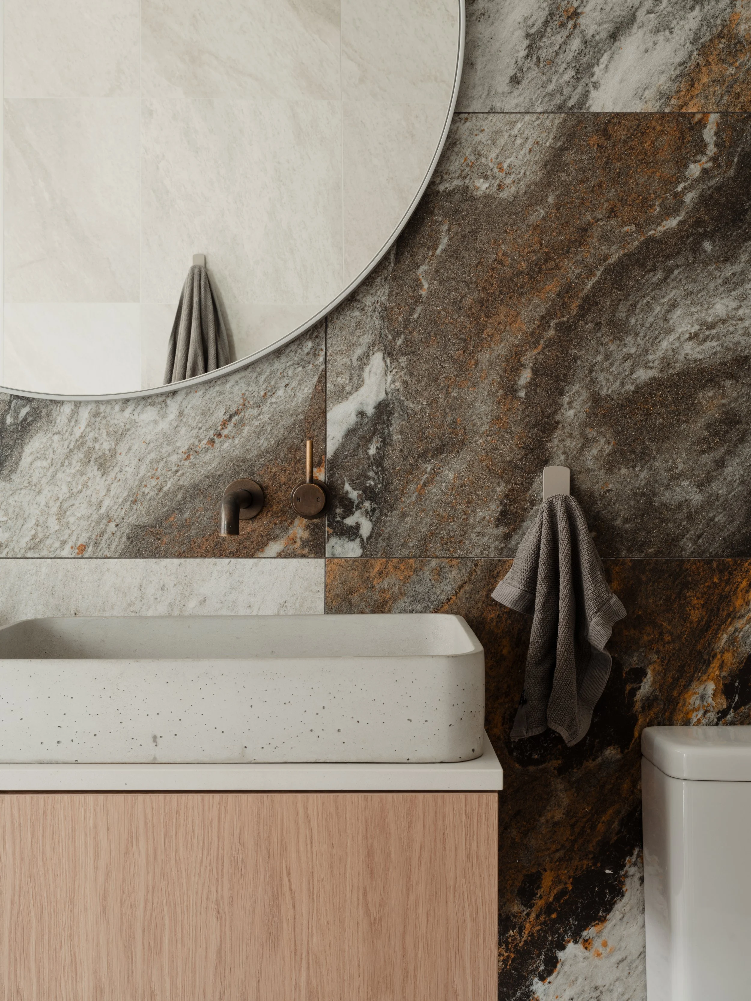 bathroom interior with bronze tapware