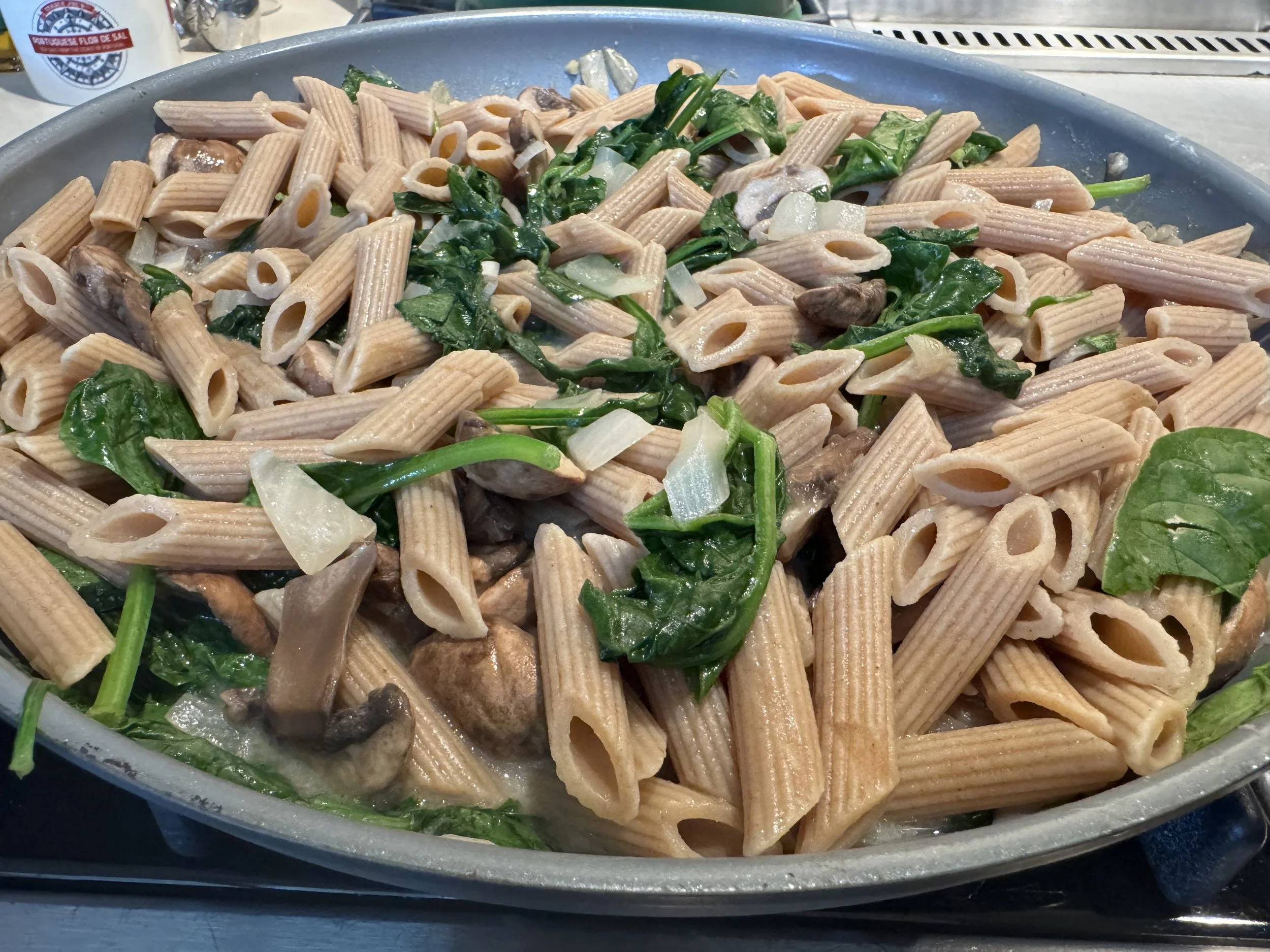 Penne Rigate with Baby Bella Mushrooms, Spinach, and Roasted Pine Nuts