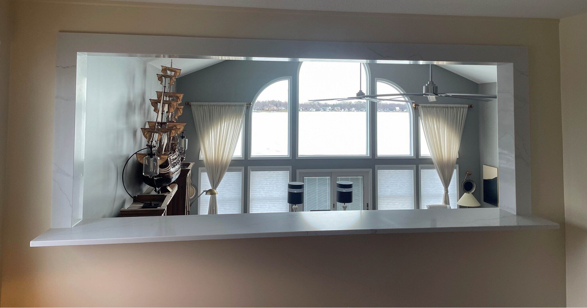 This job started as a simple sill and, thanks to the creative eye of our templater Jon, turned into a decorative quartz-wrapped pass-through creating the perfect frame for a lake view.

Material: Fantastico by @montsurfaces 

#quartzcountertops #quar