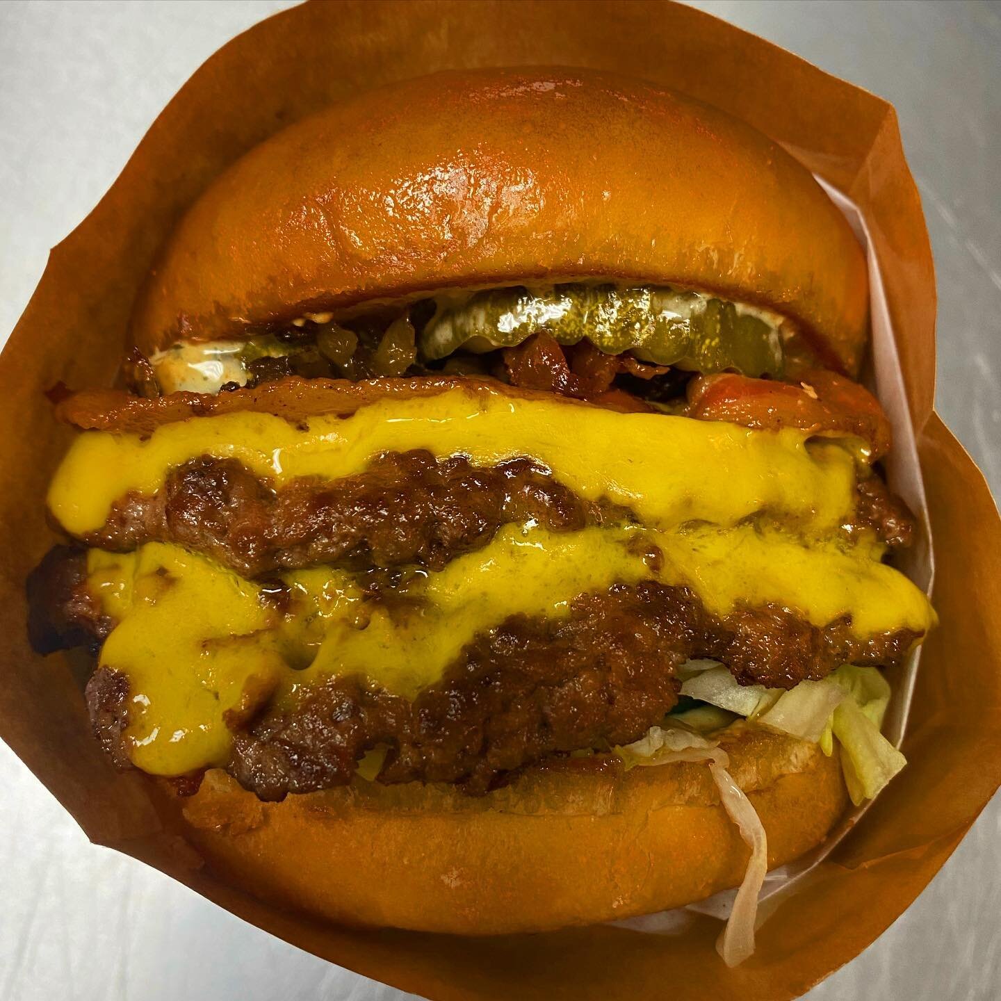 DOUBLE UP 🤤 🤤 double cheese, double patty, pickles bacon and our famous kook sauce. Start your week off right at @kookburgerco in Brigantine.