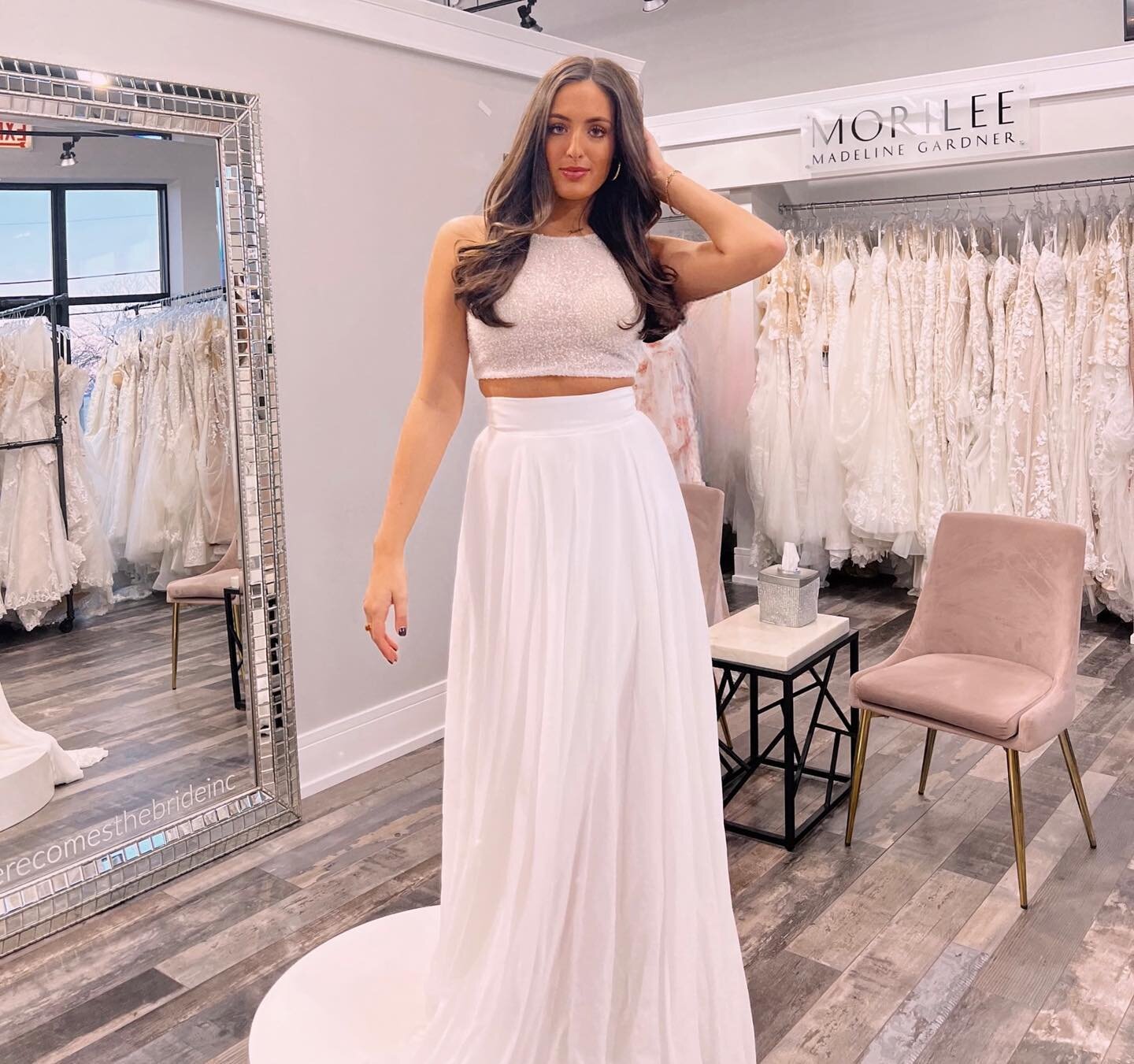 ✨Who says you have to wear a one-piece gown on your wedding day?! This new @enzoani gown is putting a modern twist on a classic style! From it&rsquo;s delicately beaded bodice to the effortlessly beautiful skirt, this two-piece gown is sure to make a